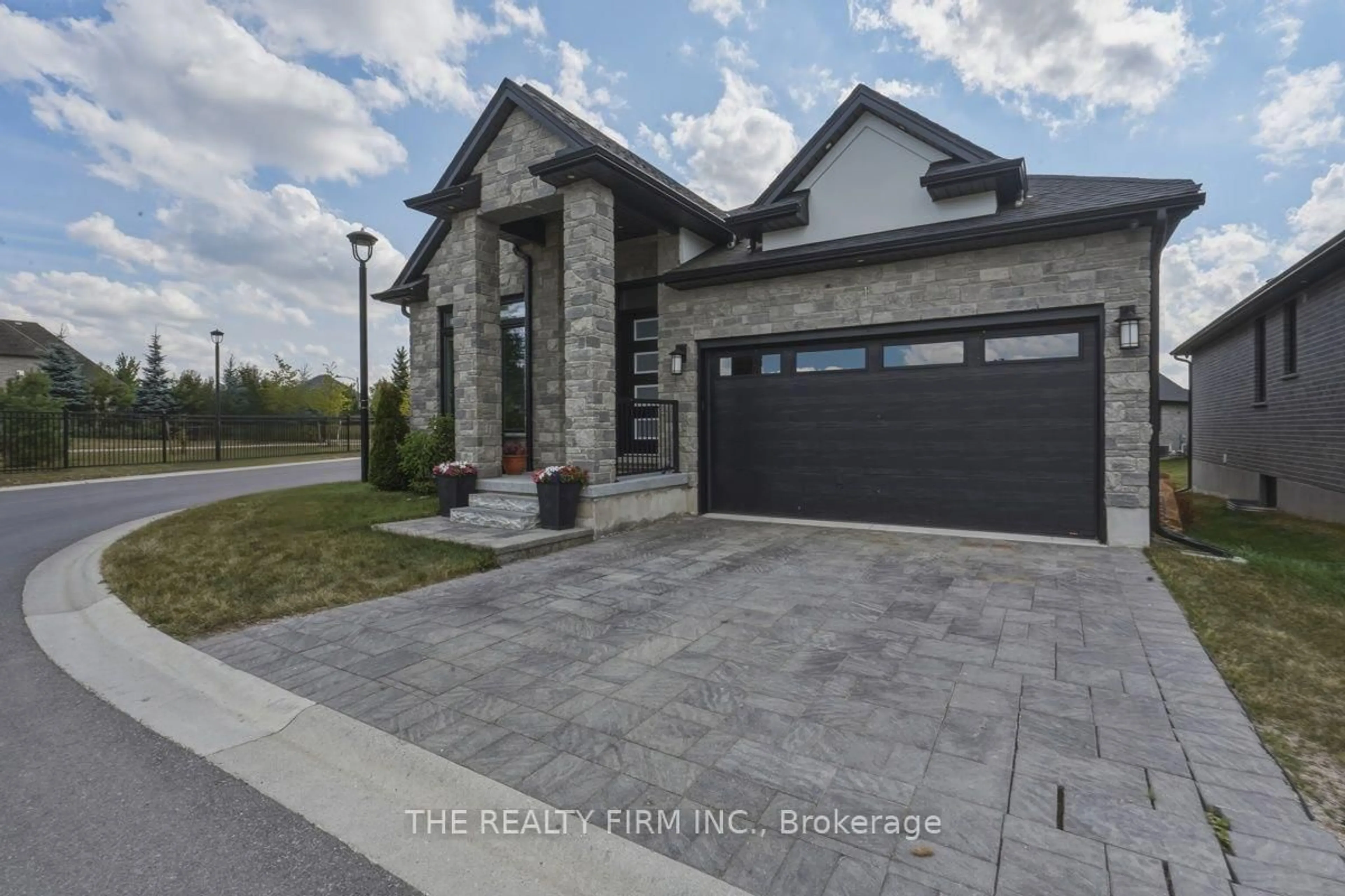 Home with brick exterior material, street for 6990 Clayton Walk #1, London South Ontario N6P 0B2