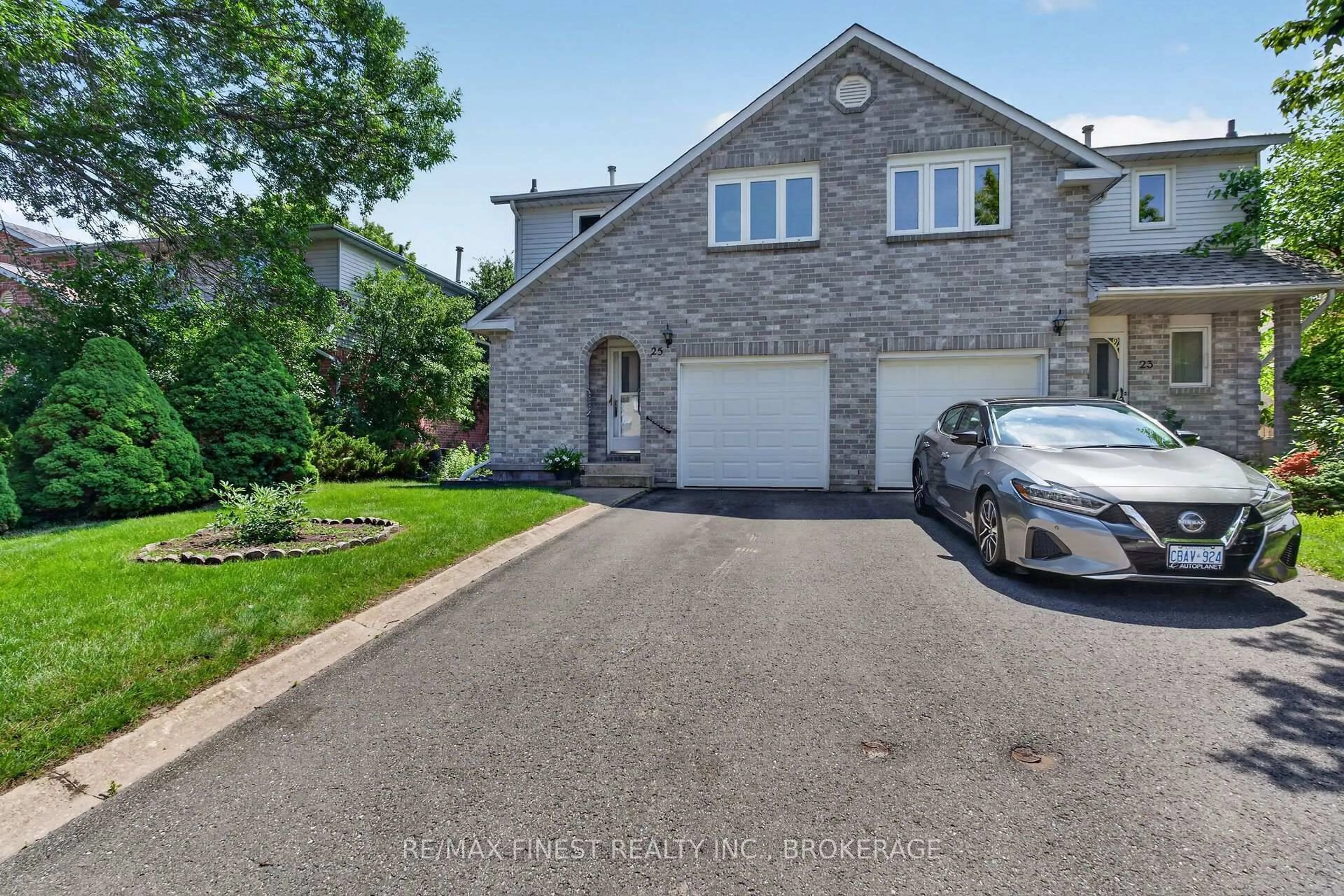 A pic from outside/outdoor area/front of a property/back of a property/a pic from drone, street for 25 Rose Abbey Dr, Kingston Ontario K7K 6W1