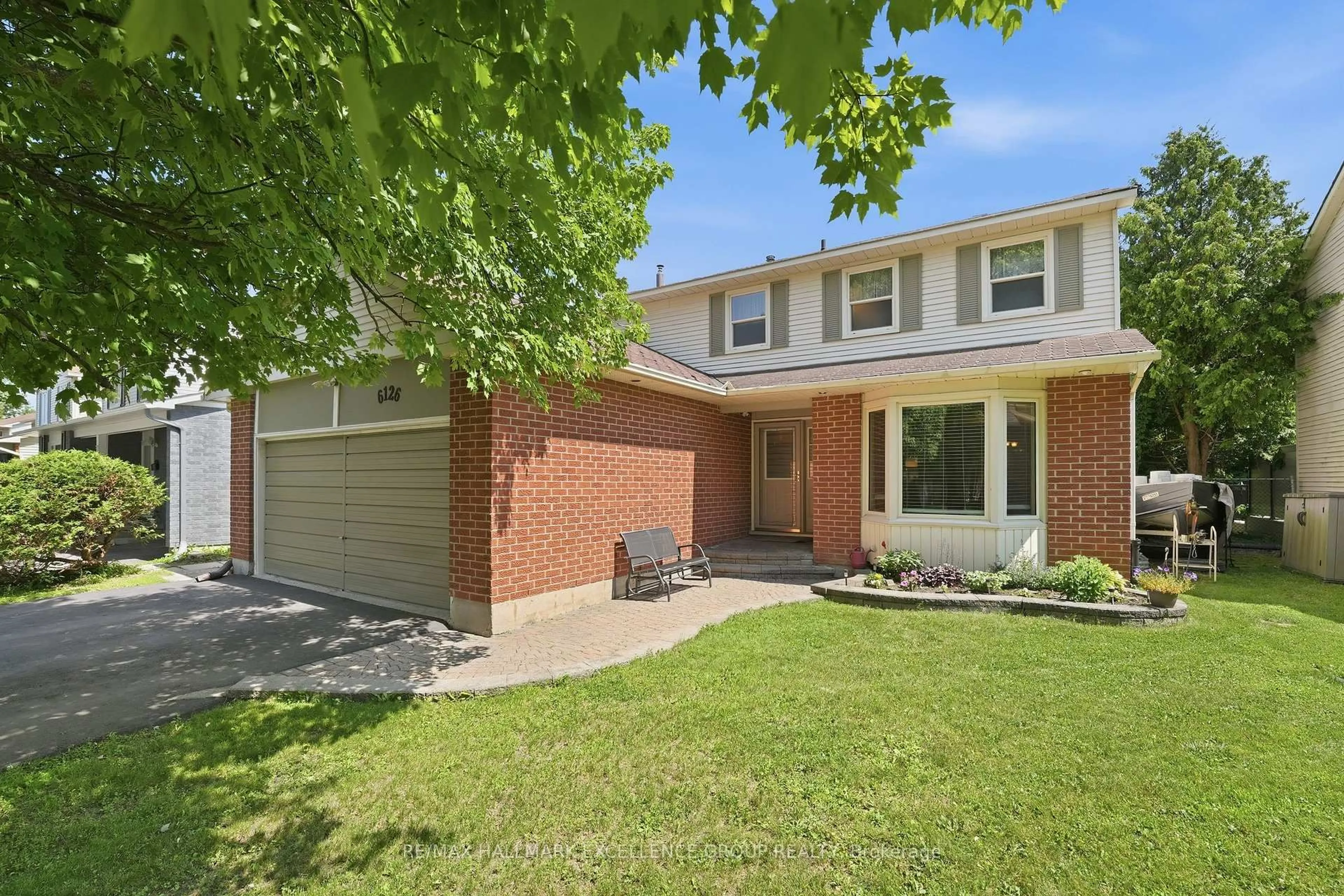 Home with brick exterior material, street for 6126 Vineyard Dr, Ottawa Ontario K1C 2N6