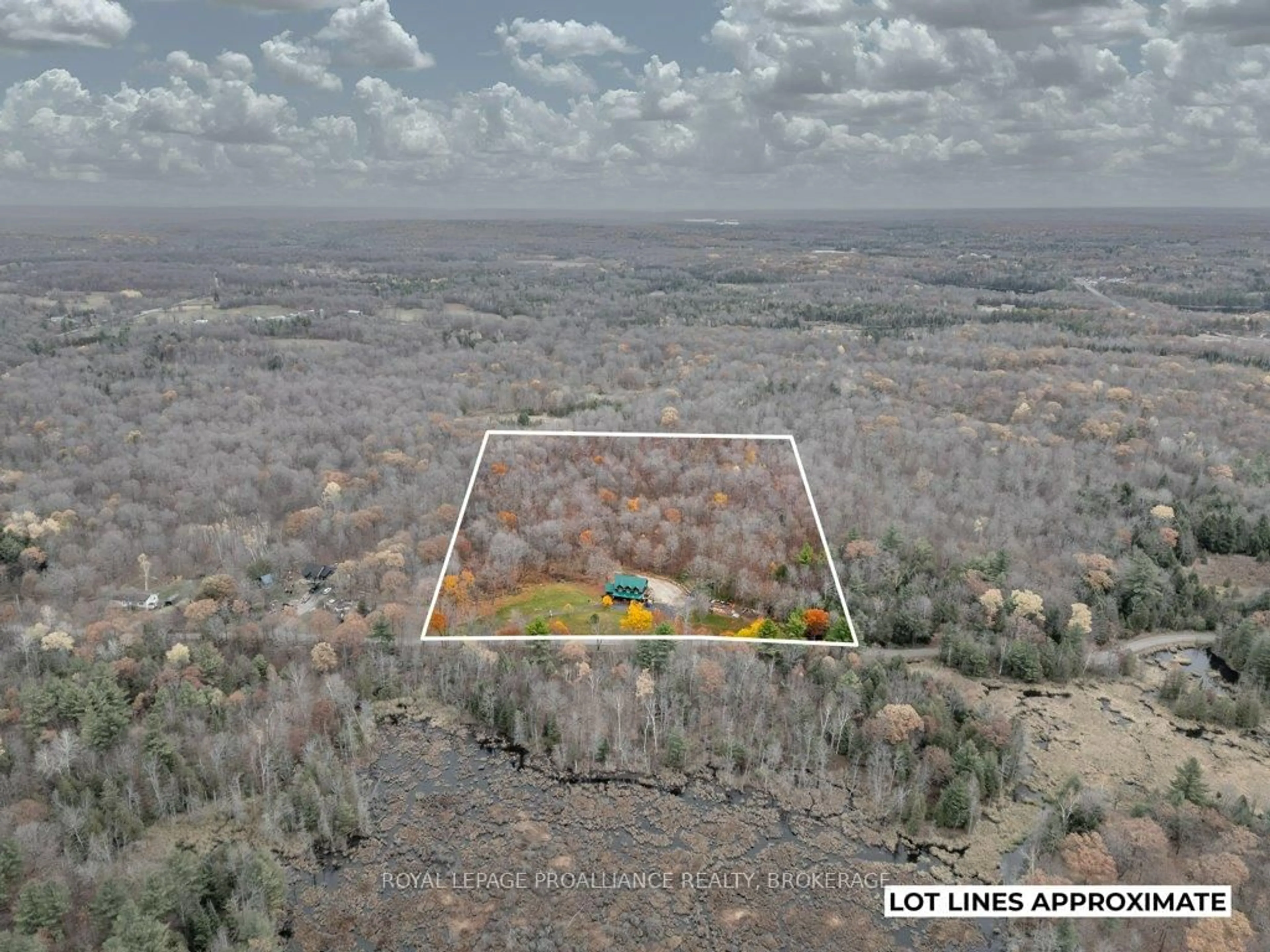 A pic from outside/outdoor area/front of a property/back of a property/a pic from drone, forest/trees view for 1157 Townline Rd, Sharbot Lake Ontario K0H 2P0