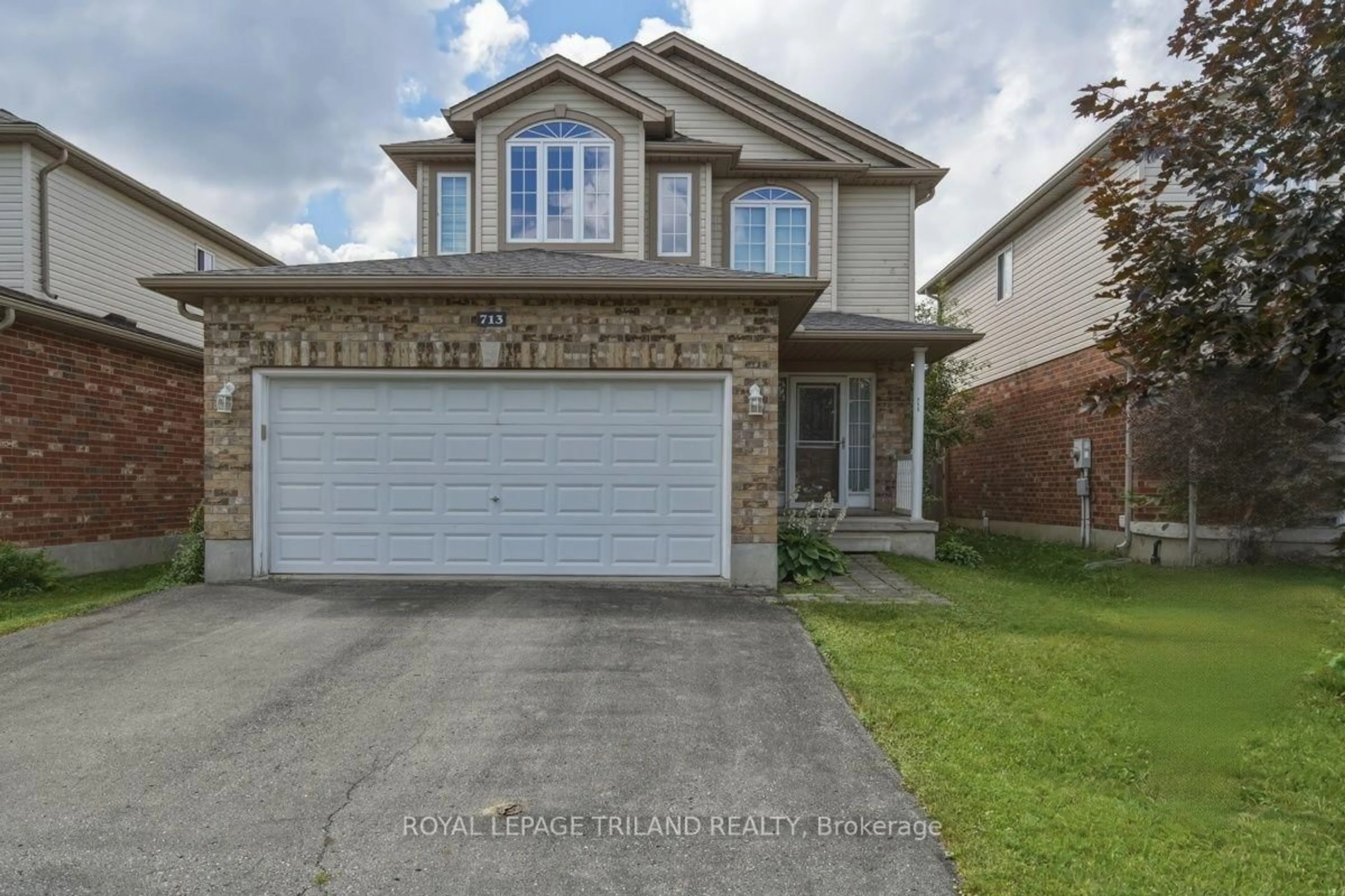 Home with brick exterior material, street for 713 Thistlewood Dr, London North Ontario N5X 0A7