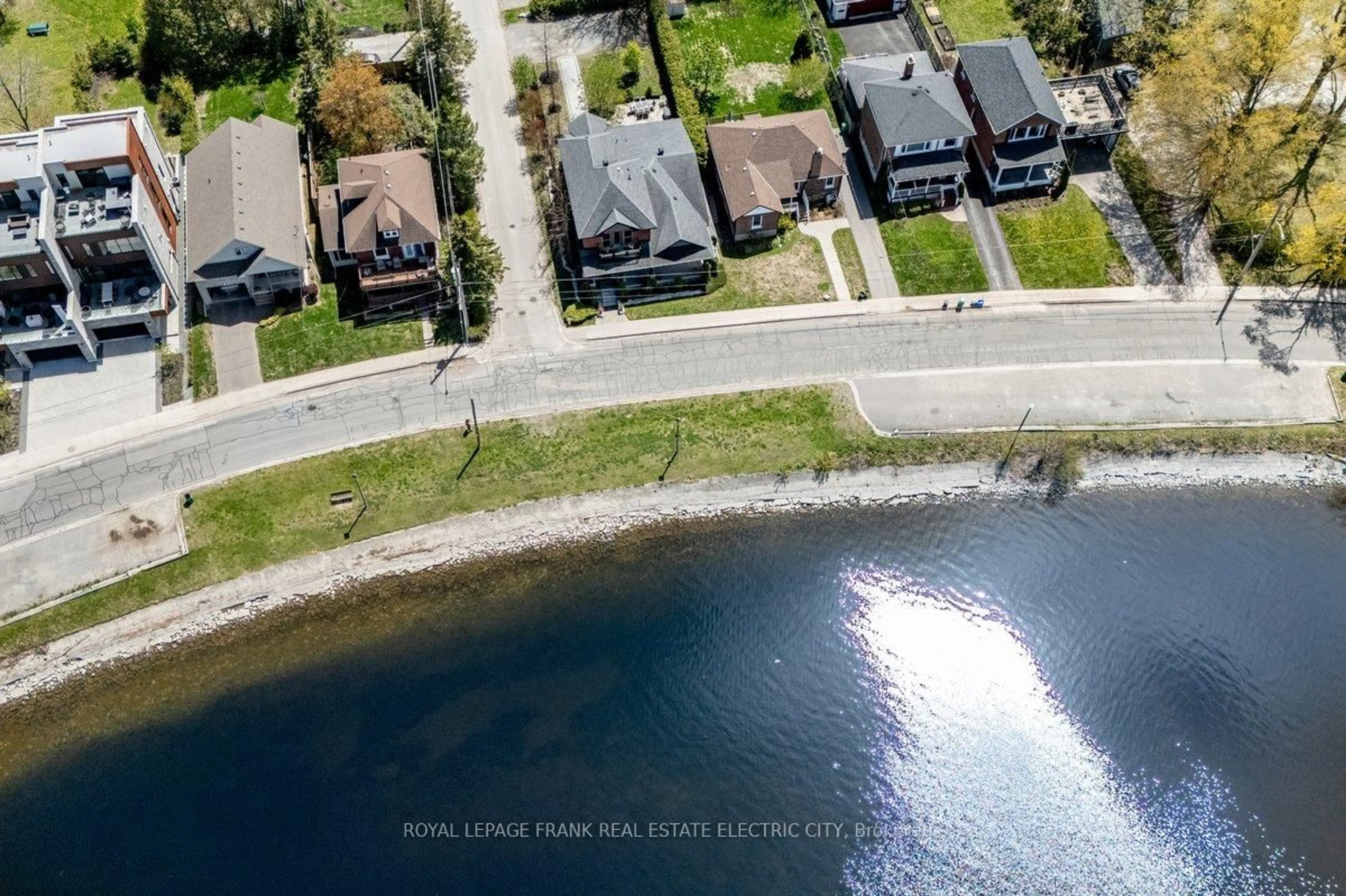 A pic from outside/outdoor area/front of a property/back of a property/a pic from drone, water/lake/river/ocean view for 97 Crescent St, Peterborough Ontario K9J 2G3