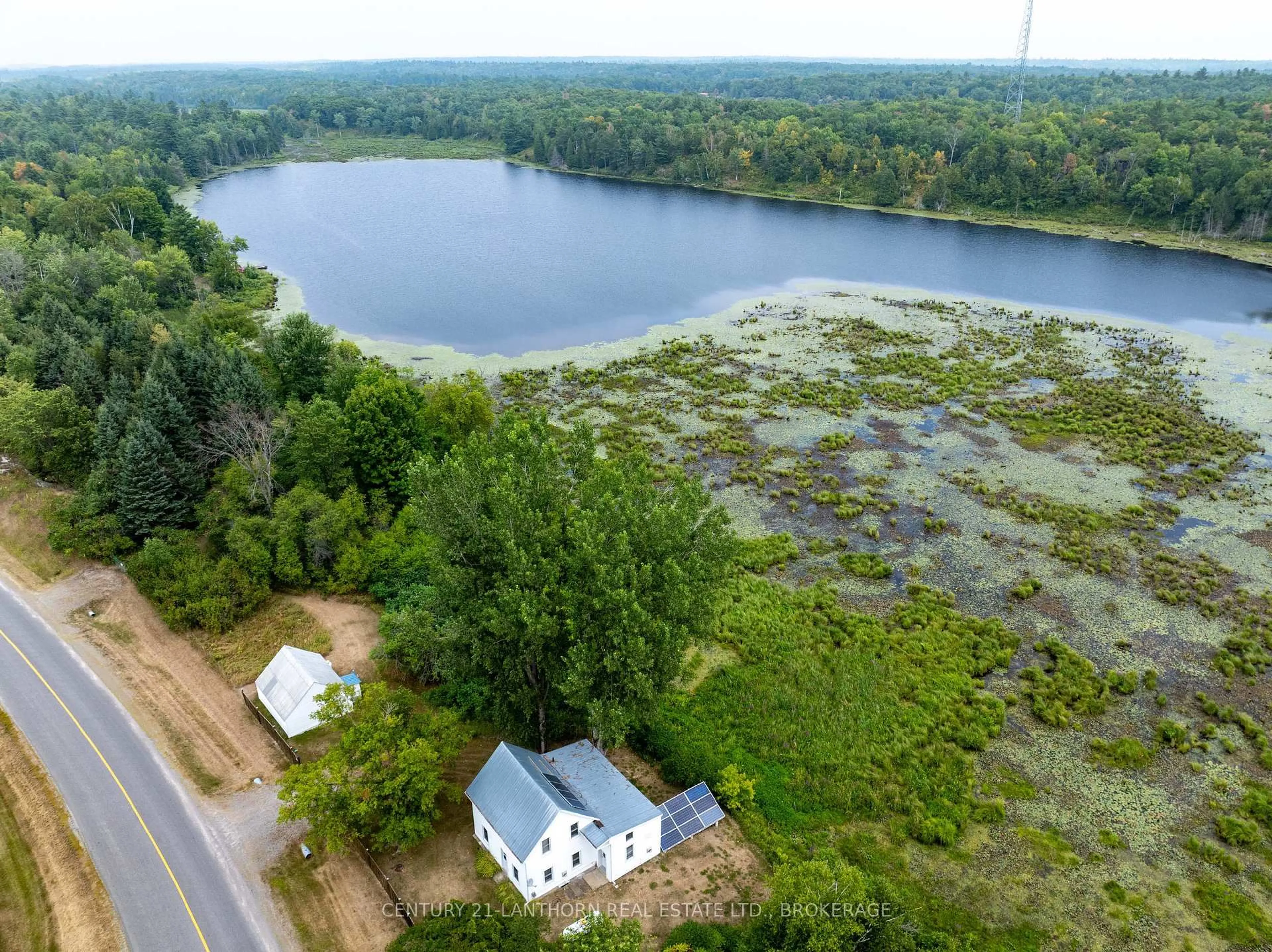 A pic from outside/outdoor area/front of a property/back of a property/a pic from drone, water/lake/river/ocean view for 2905 County Rd 15 Rd, Tamworth Ontario K0K 3G0