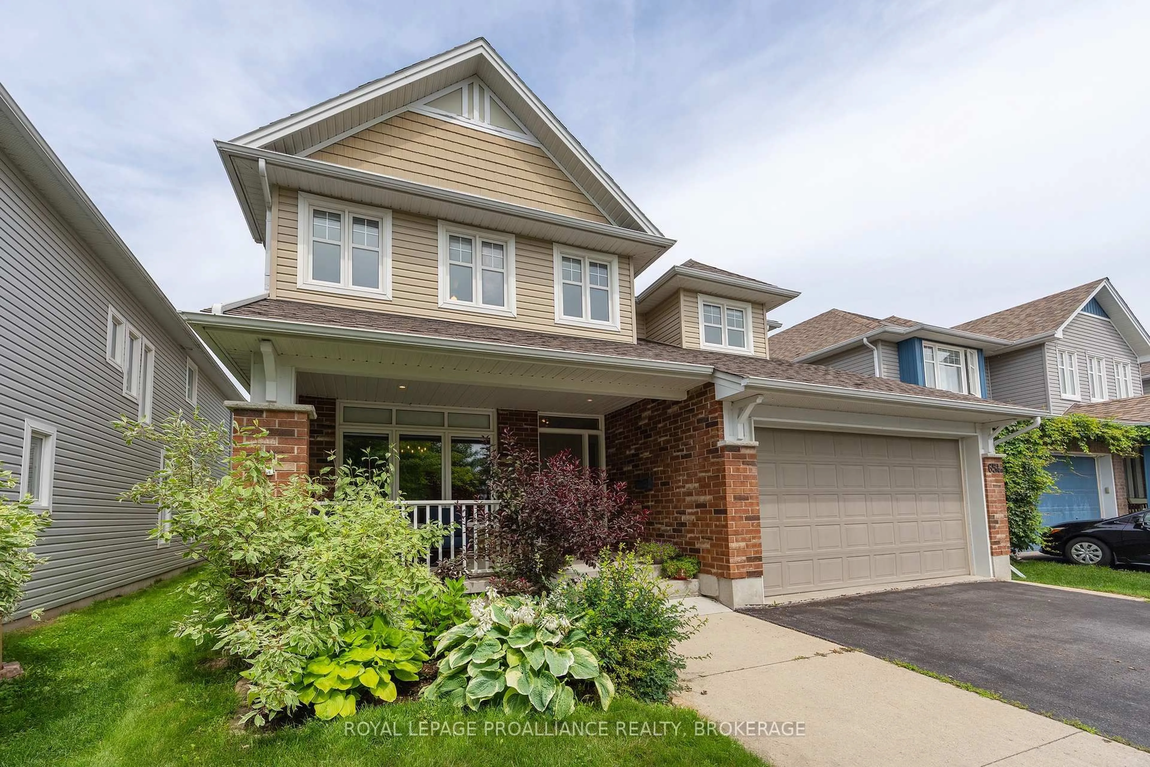 Home with brick exterior material, street for 654 Fieldstone Dr, Kingston Ontario K7K 0C6