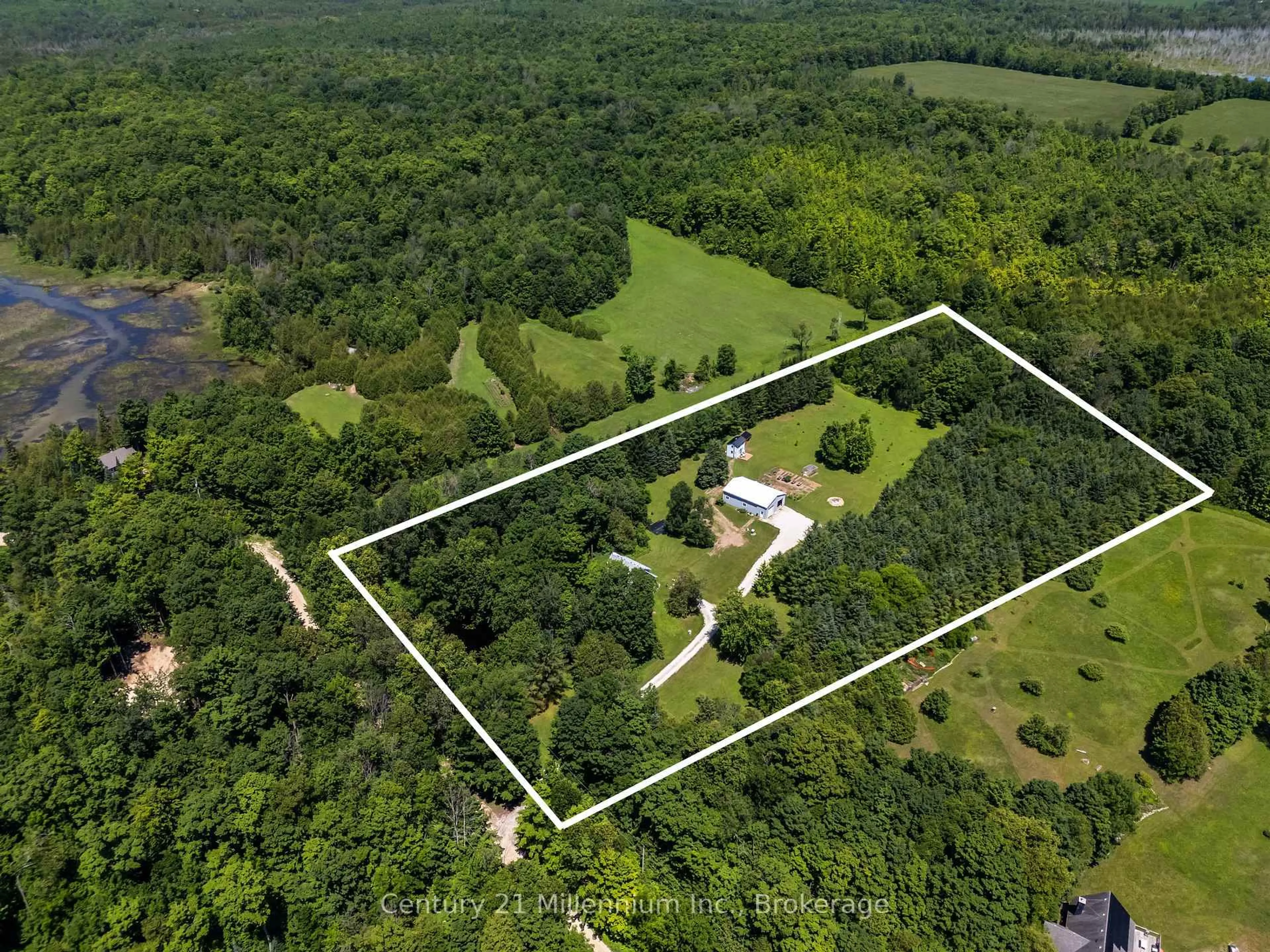 A pic from outside/outdoor area/front of a property/back of a property/a pic from drone, forest/trees view for 414681 Baseline Rd, West Grey Ontario N0C 1H0