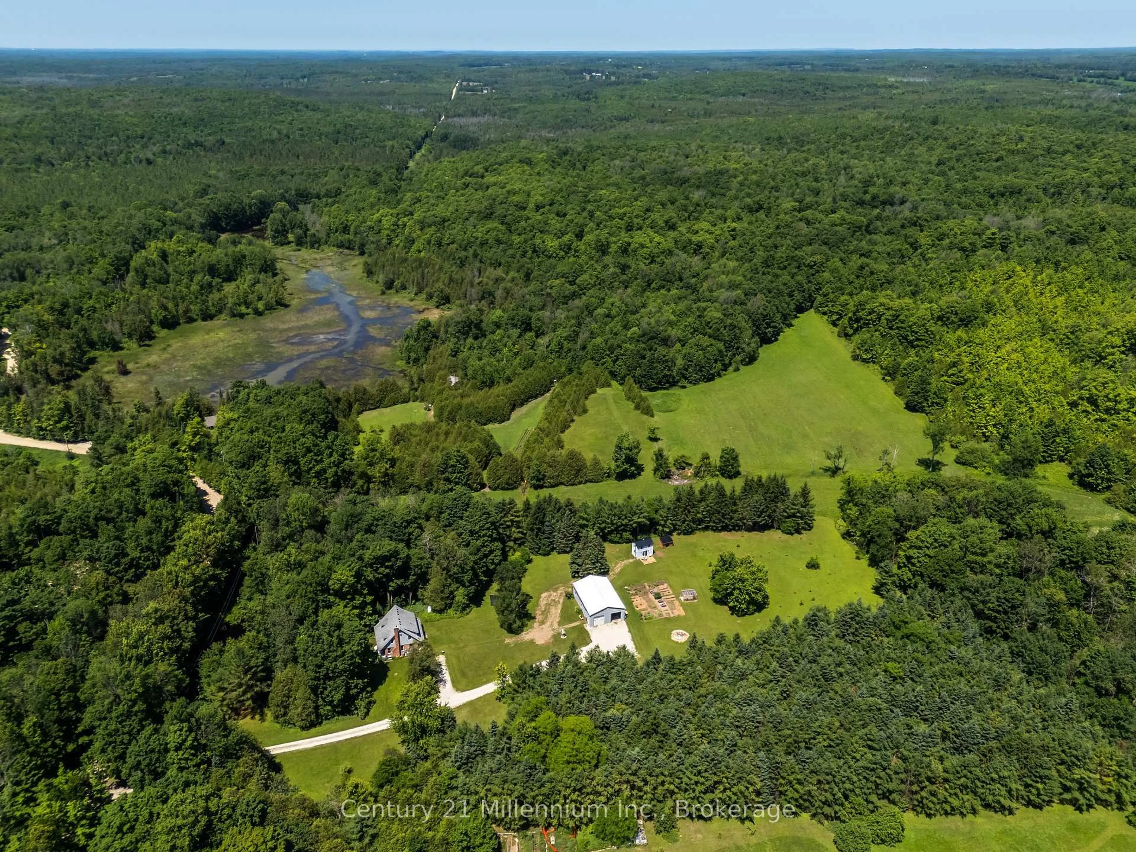 A pic from outside/outdoor area/front of a property/back of a property/a pic from drone, water/lake/river/ocean view for 414681 Baseline Rd, West Grey Ontario N0C 1H0