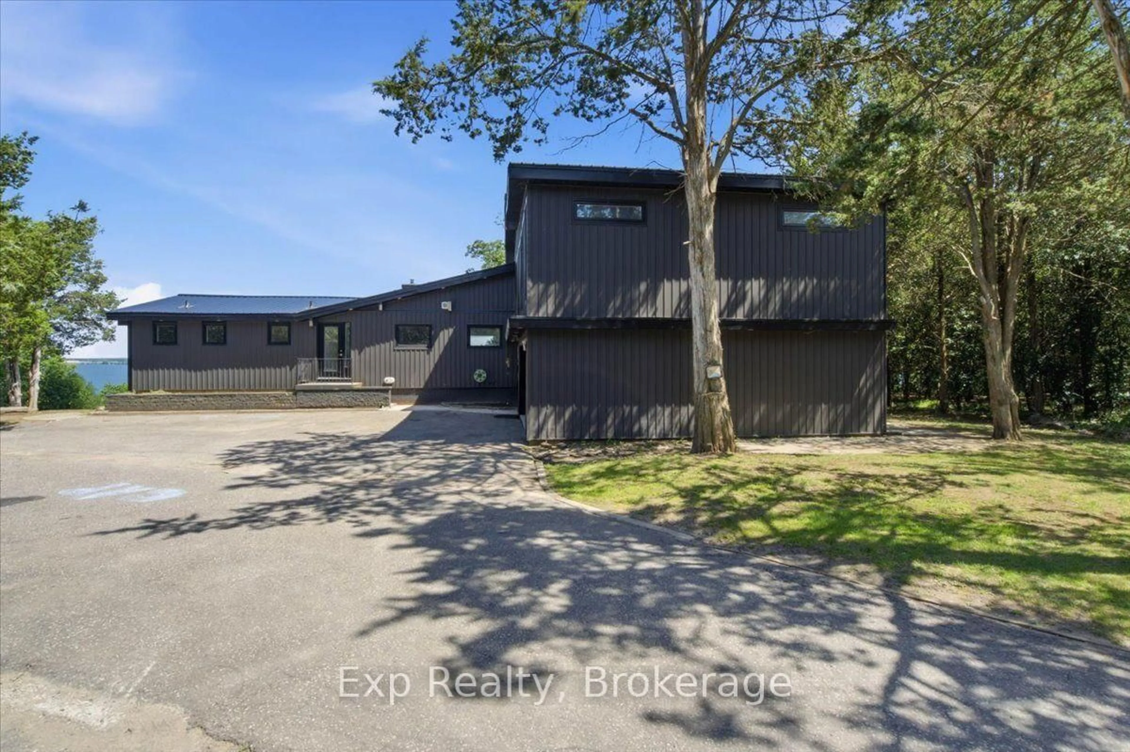 A pic from outside/outdoor area/front of a property/back of a property/a pic from drone, building for 23 Sidney Shore Lane, Prince Edward County Ontario K0K 2T0