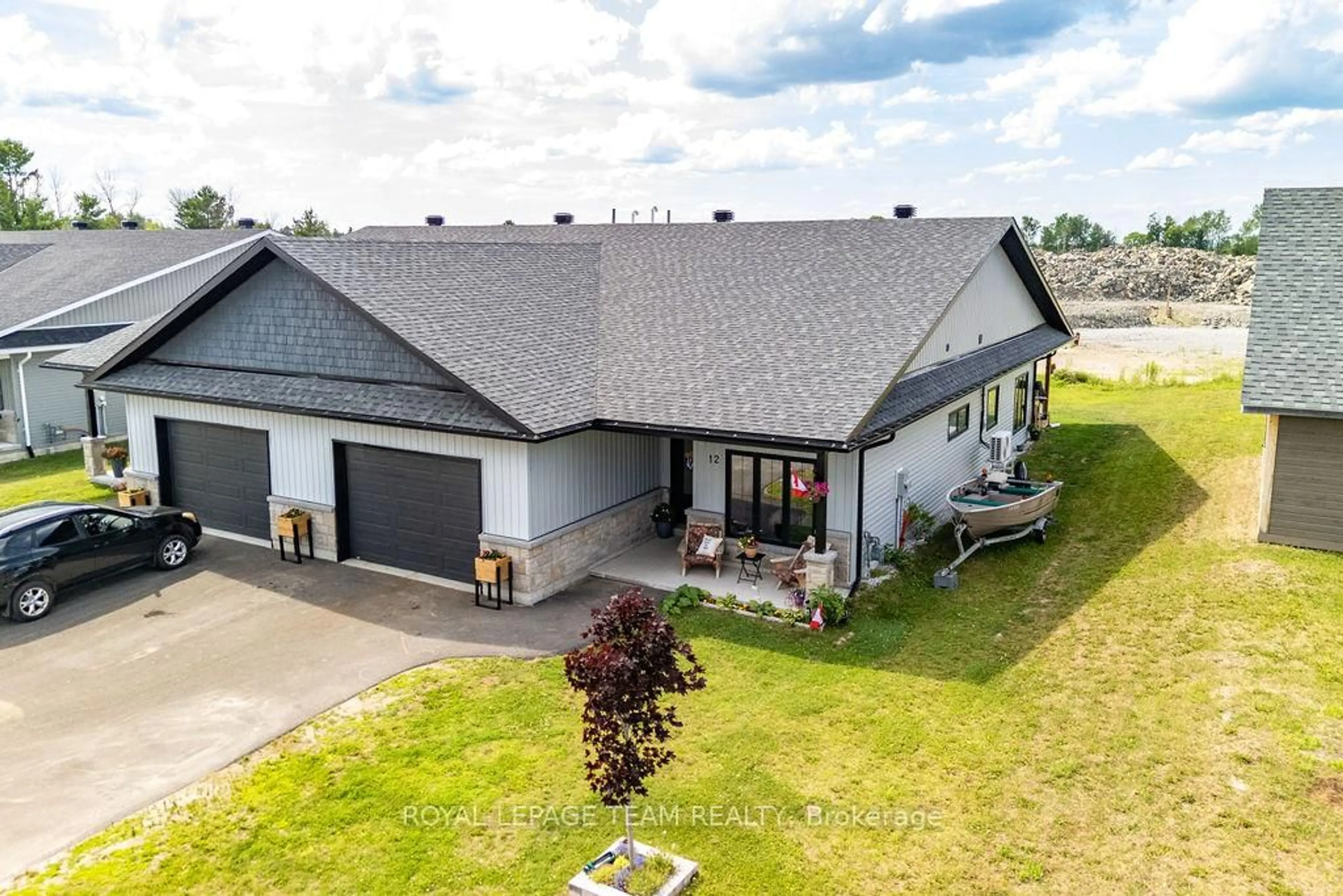 A pic from outside/outdoor area/front of a property/back of a property/a pic from drone, unknown for 12 Bamagillia St, Cobden Ontario K0J 1K0