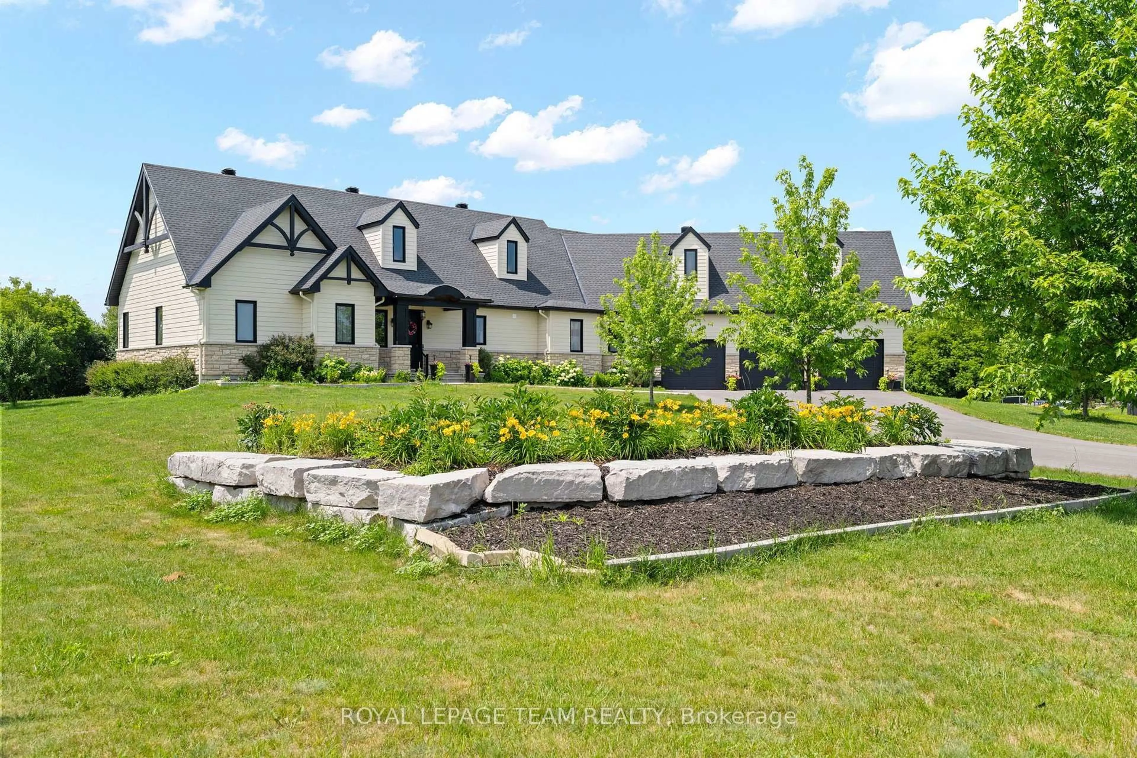 A pic from outside/outdoor area/front of a property/back of a property/a pic from drone, mountain view for 145 Barrdon Rd, Carp Ontario K0A 1L0