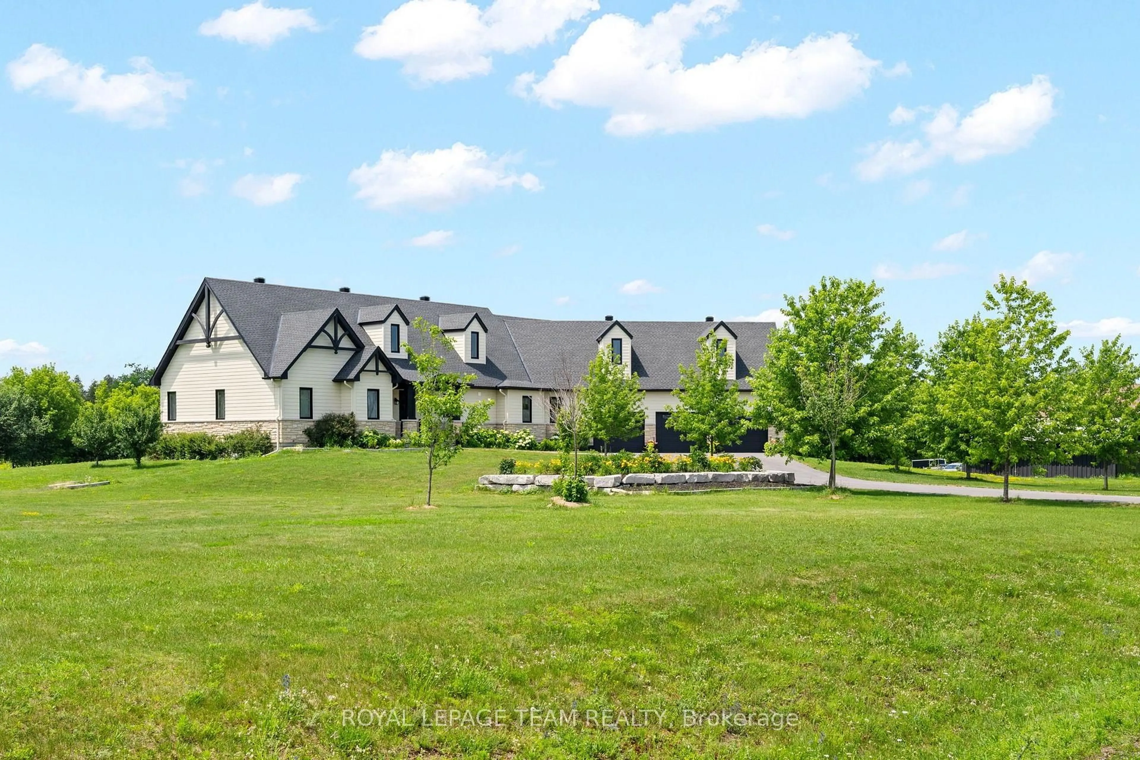 A pic from outside/outdoor area/front of a property/back of a property/a pic from drone, mountain view for 145 Barrdon Rd, Carp Ontario K0A 1L0
