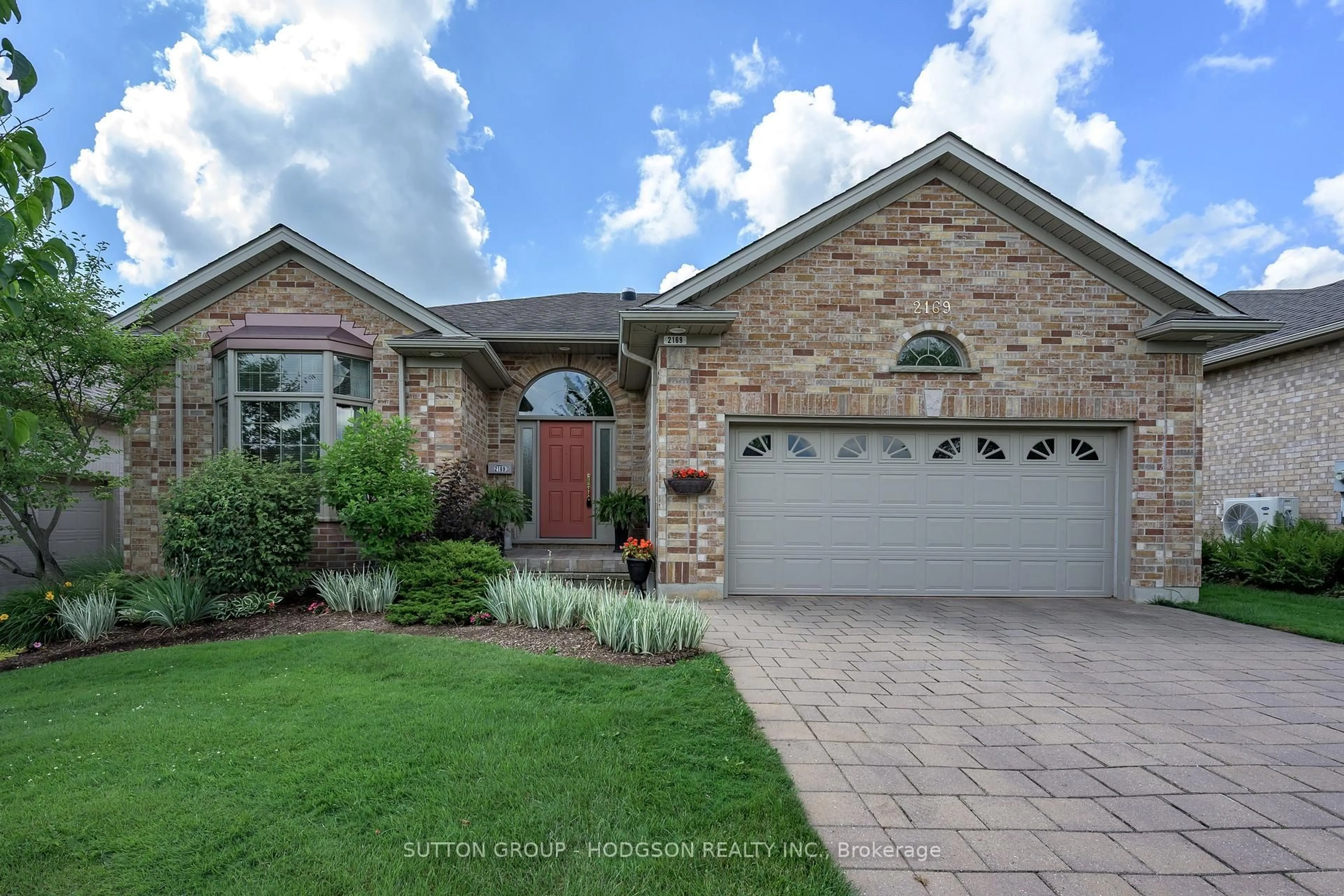 Home with brick exterior material, street for 2169 Jack Nash Dr, London South Ontario N6K 5R1