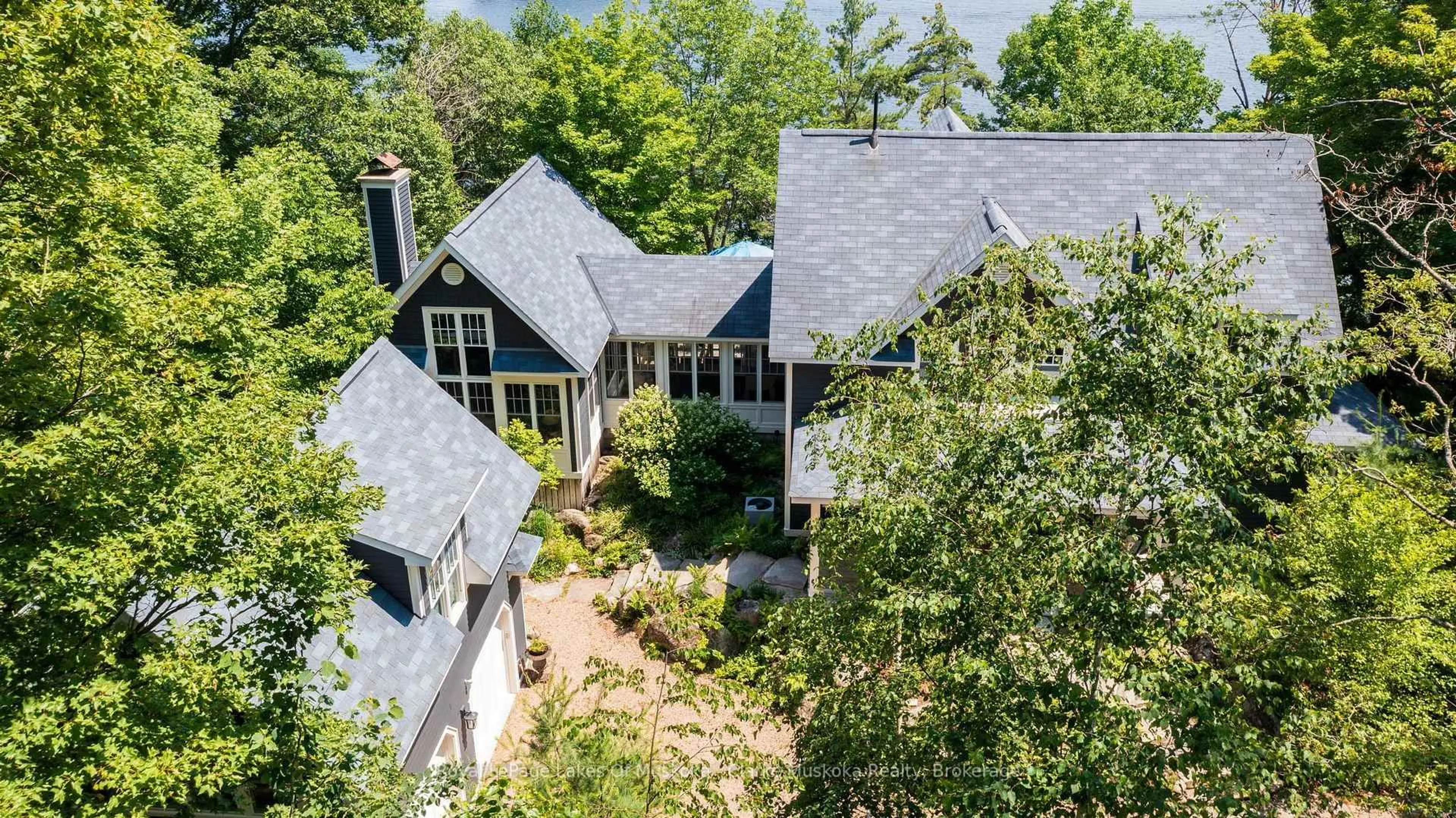 A pic from outside/outdoor area/front of a property/back of a property/a pic from drone, unknown for 1019 Bluff Rd #5, Muskoka Lakes Ontario P0B 1J0