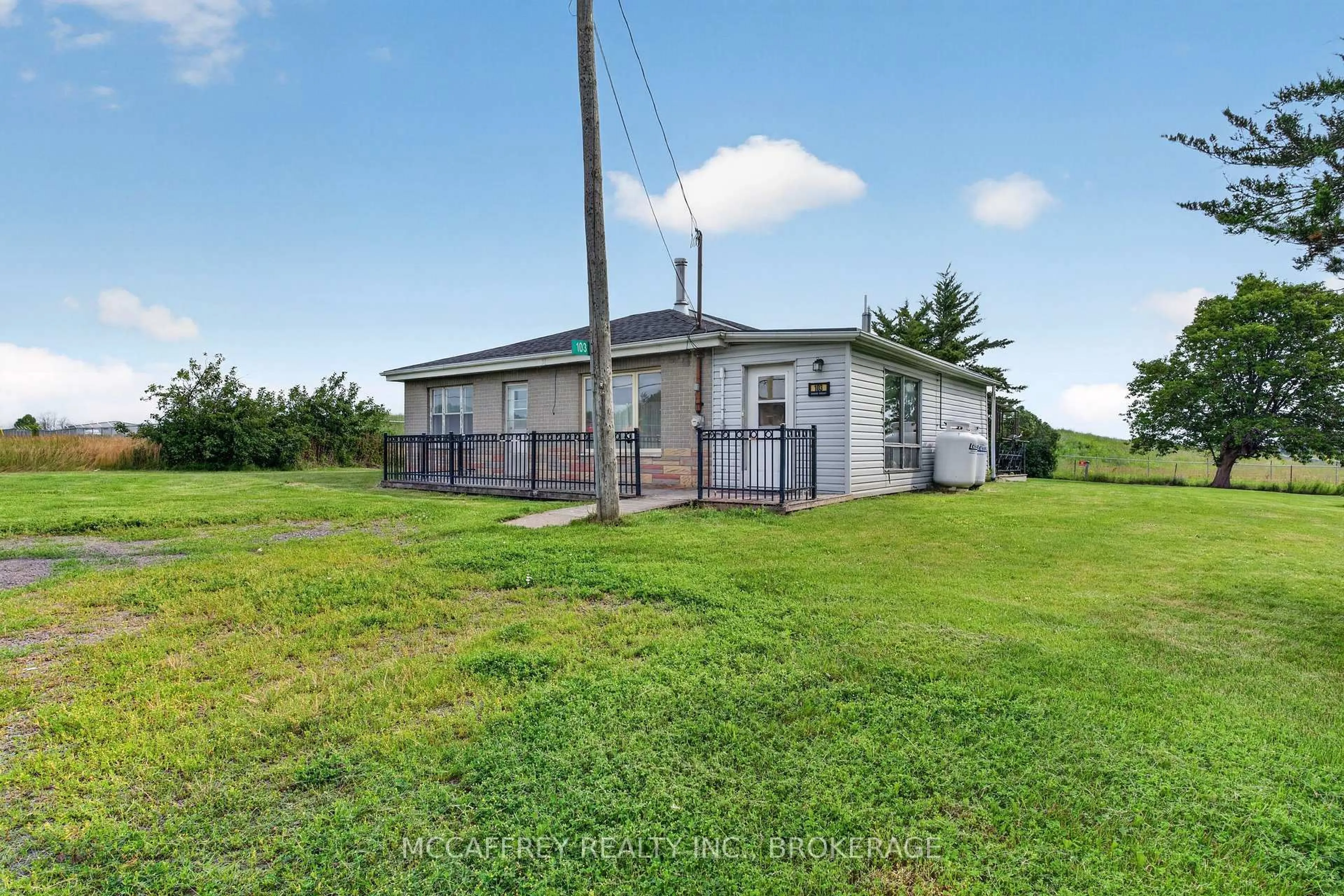 A pic from outside/outdoor area/front of a property/back of a property/a pic from drone, unknown for 103 County Road 4 Rd, Bath Ontario K0H 1G0