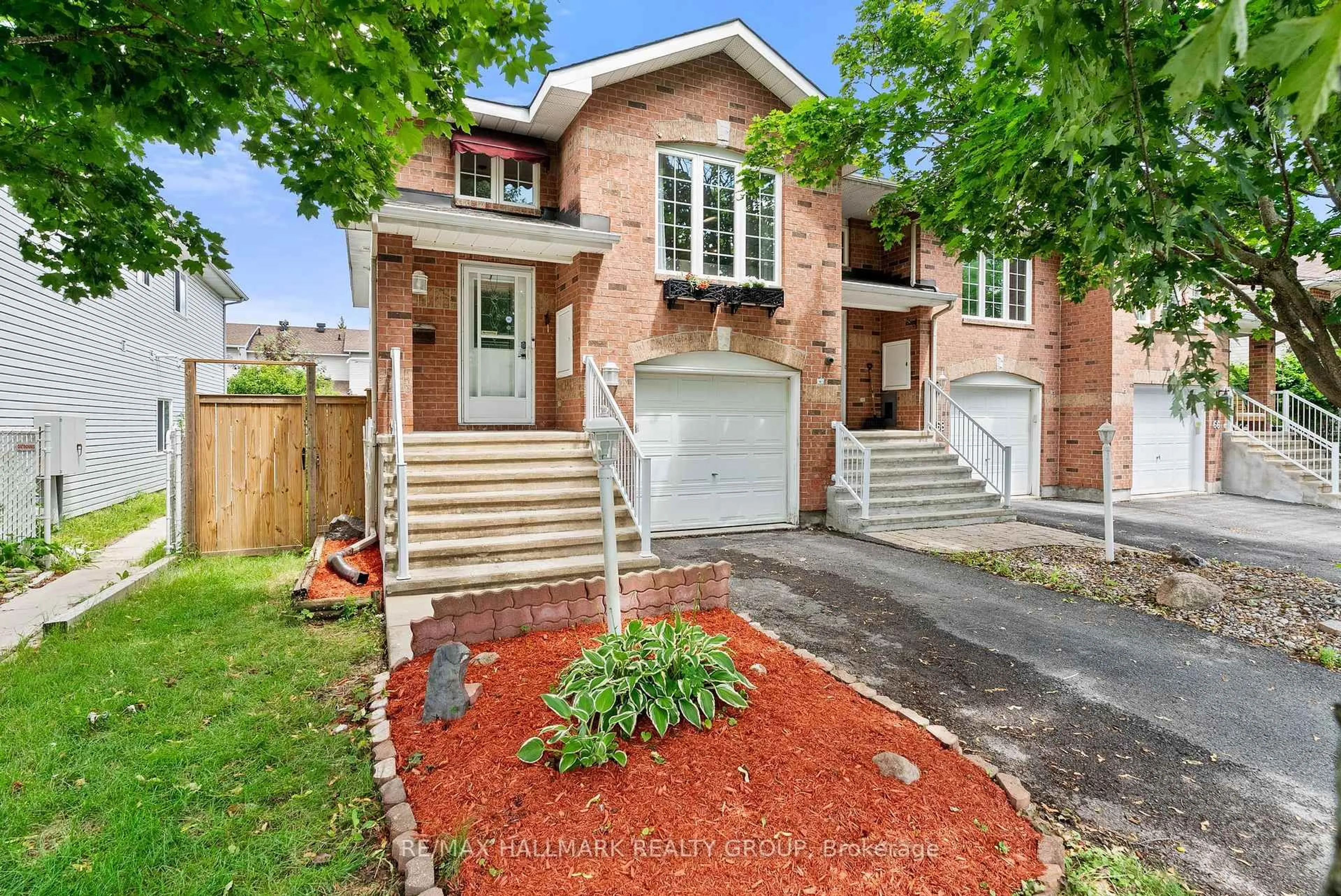 Home with brick exterior material, street for 70 Whalings Circ, Stittsville Ontario K2S 1S4