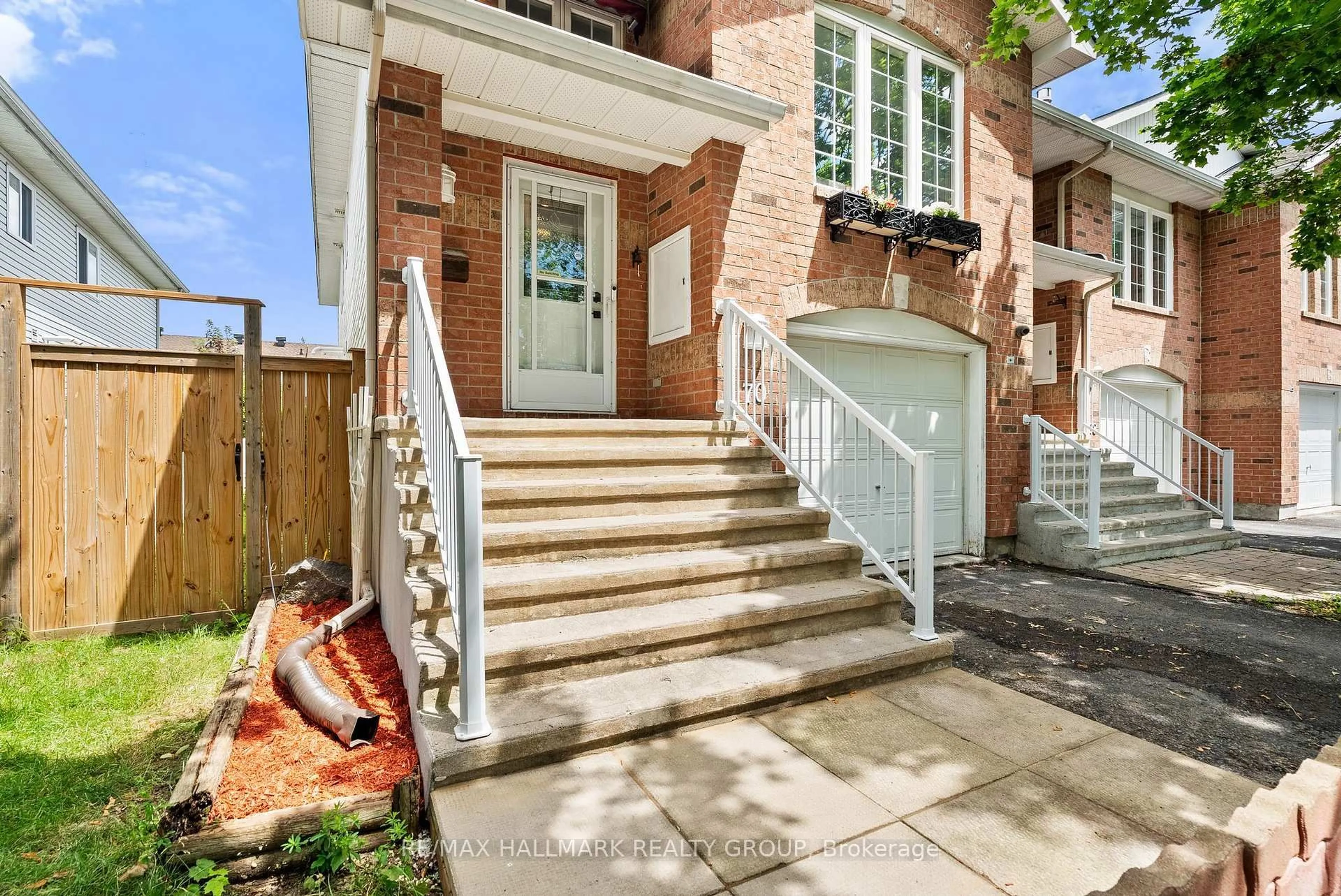 Home with brick exterior material, street for 70 Whalings Circ, Stittsville Ontario K2S 1S4