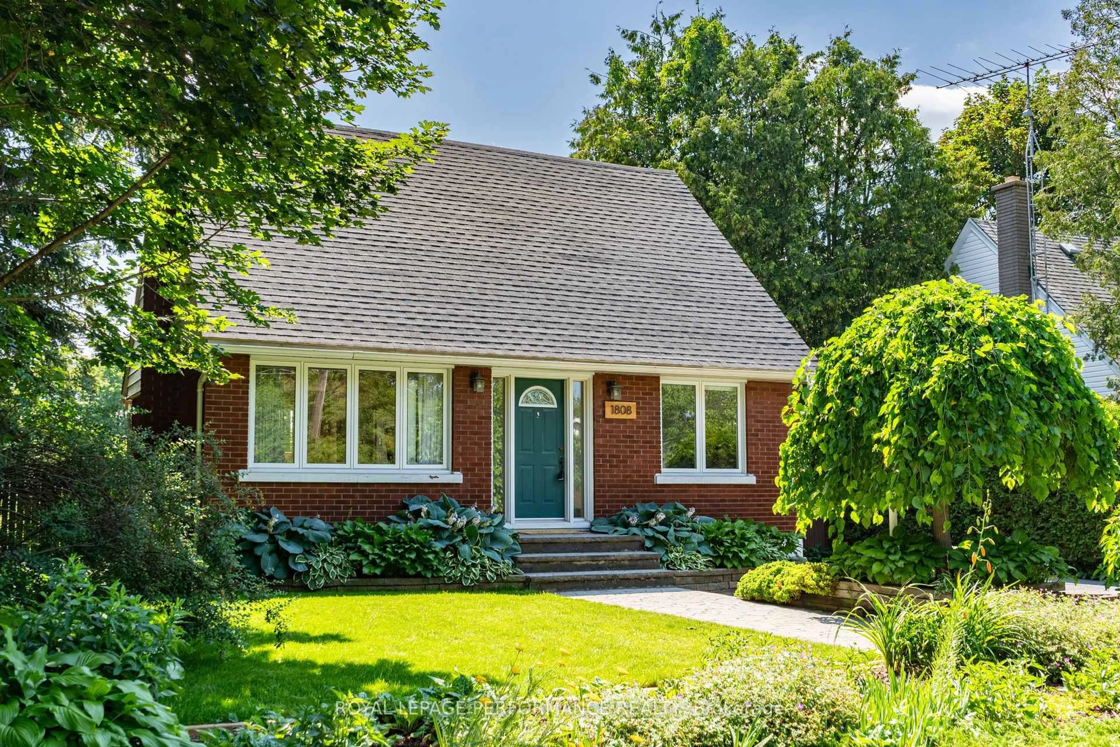 Home with brick exterior material, street for 1808 Russell Rd, Ottawa Ontario K1G 1L5