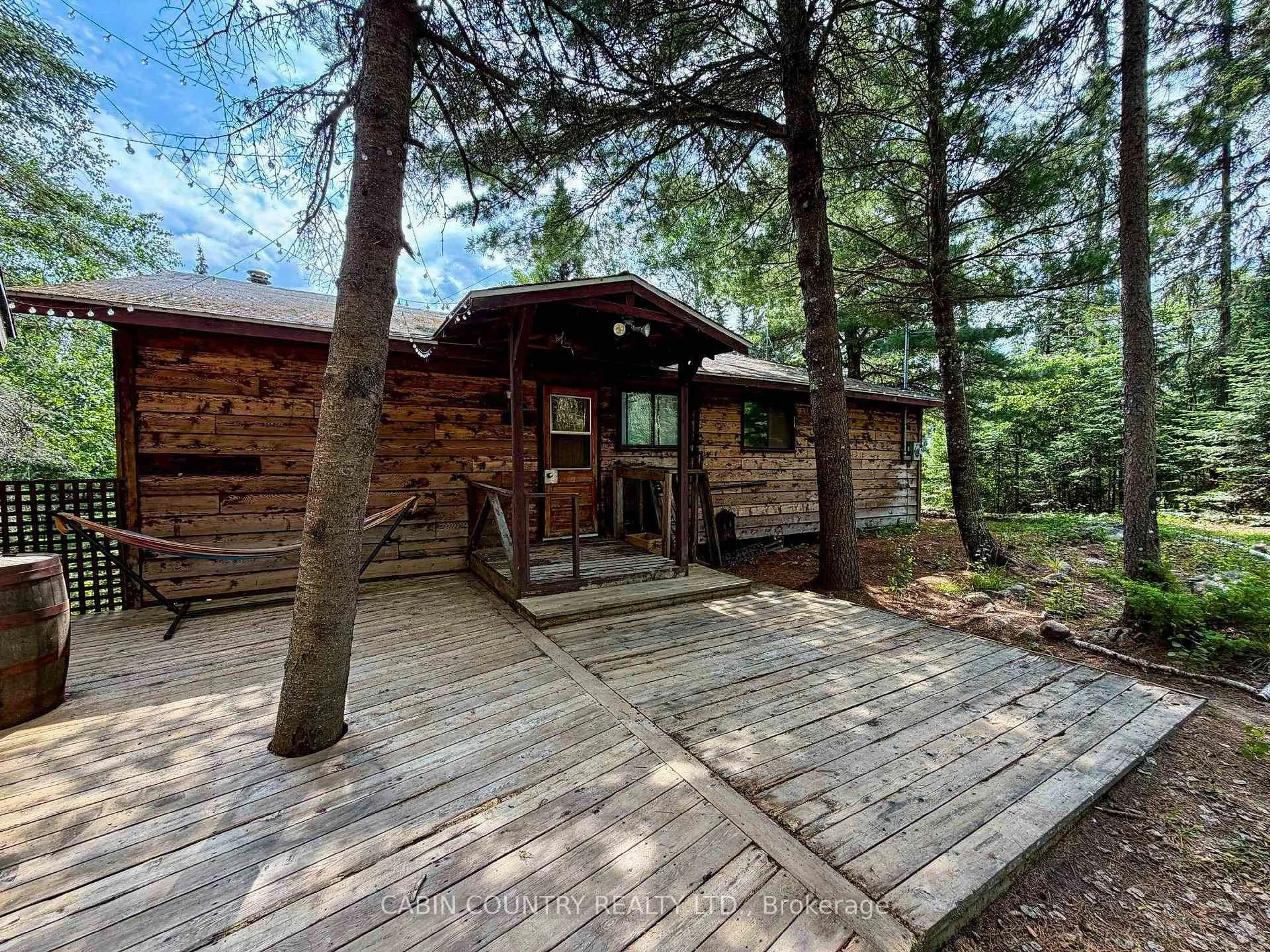 A pic from outside/outdoor area/front of a property/back of a property/a pic from drone, forest/trees view for 909 Austin Lake Road, Kenora Ontario P9N 4R2
