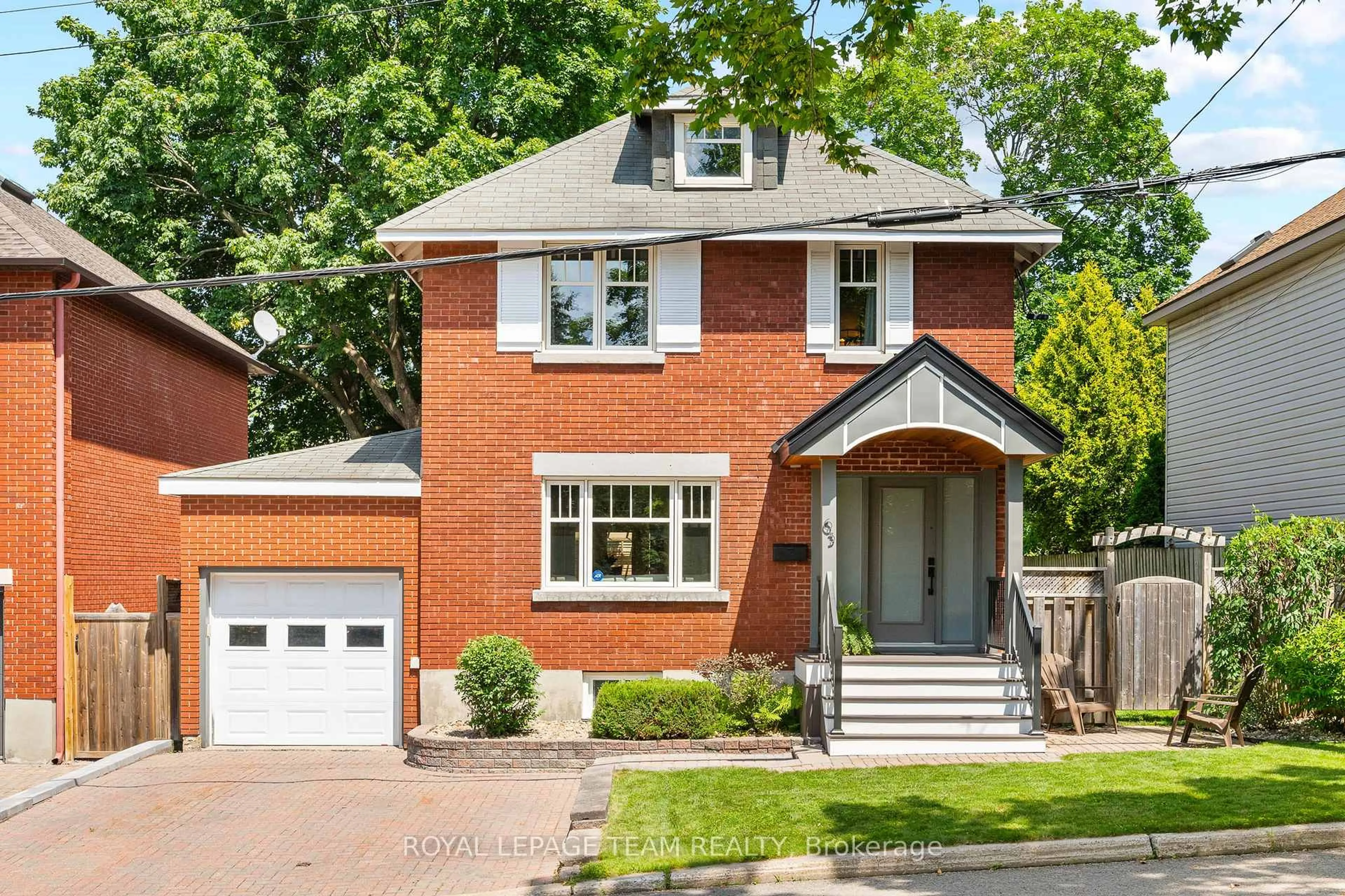 Home with brick exterior material, street for 63 Gwynne Ave, Ottawa Ontario K1Y 1X1