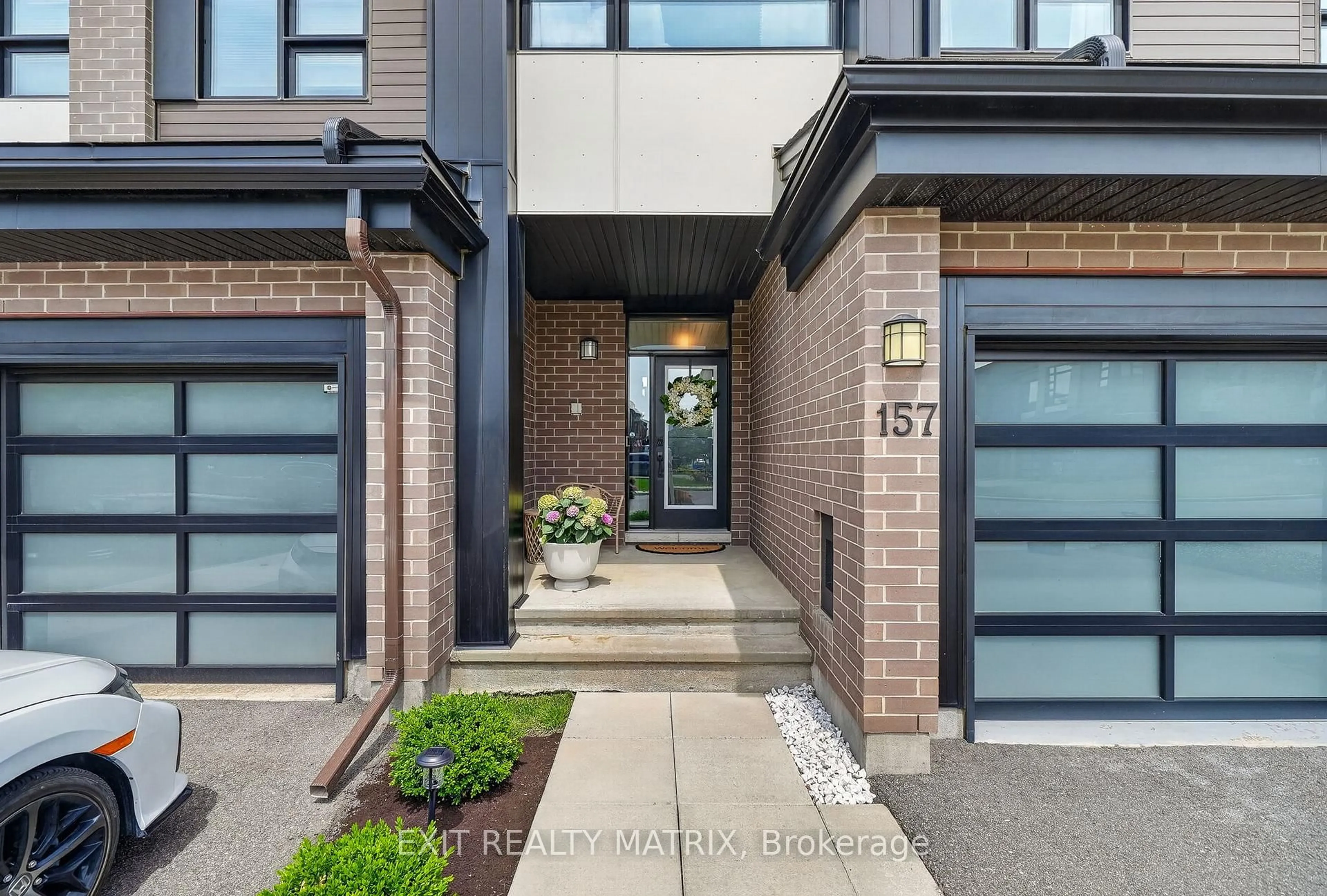 Home with brick exterior material, street for 157 Longworth Ave, Ottawa Ontario K1T 0T2