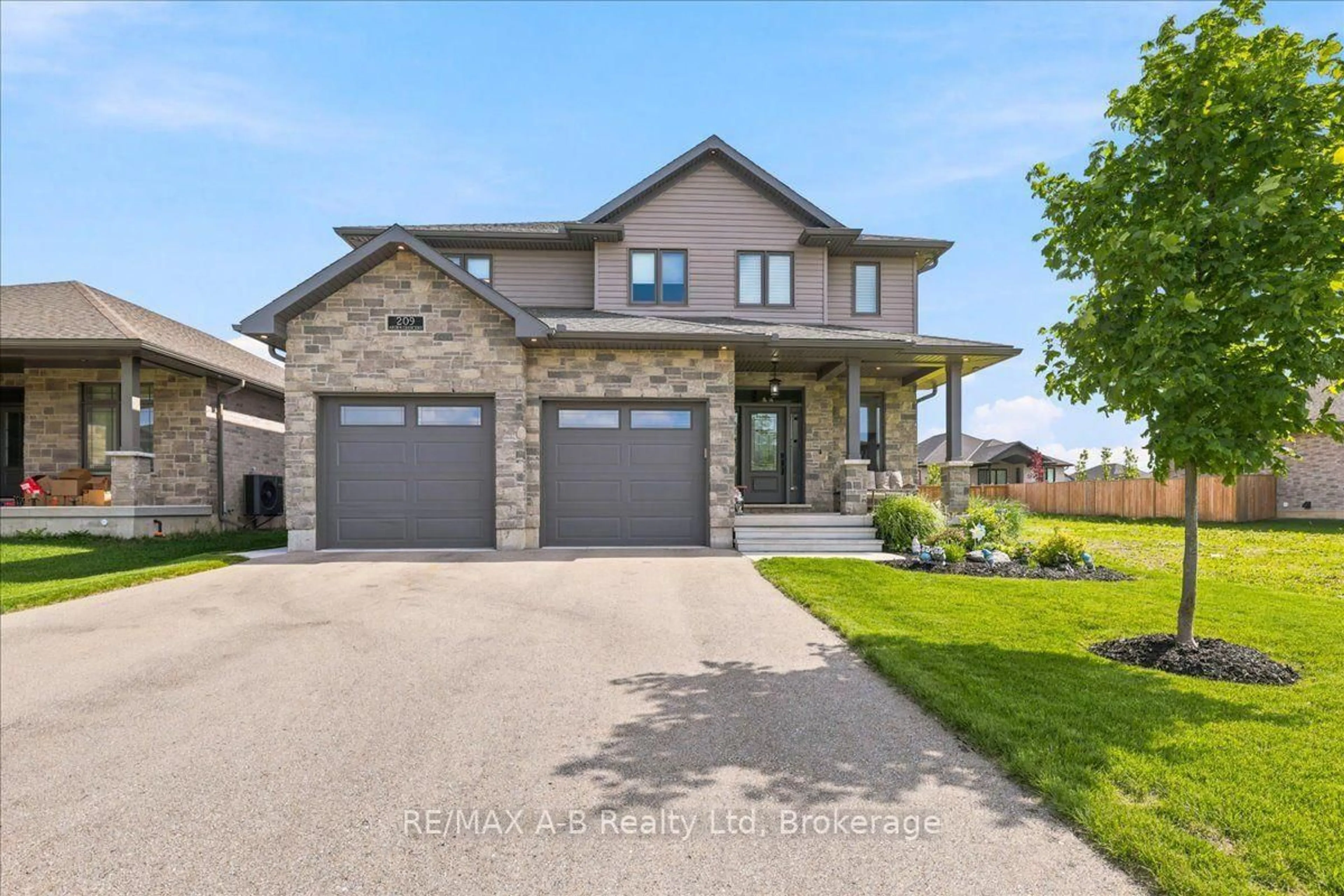 Home with brick exterior material, street for 209 Arden Cres, West Perth Ontario N0K 1N0