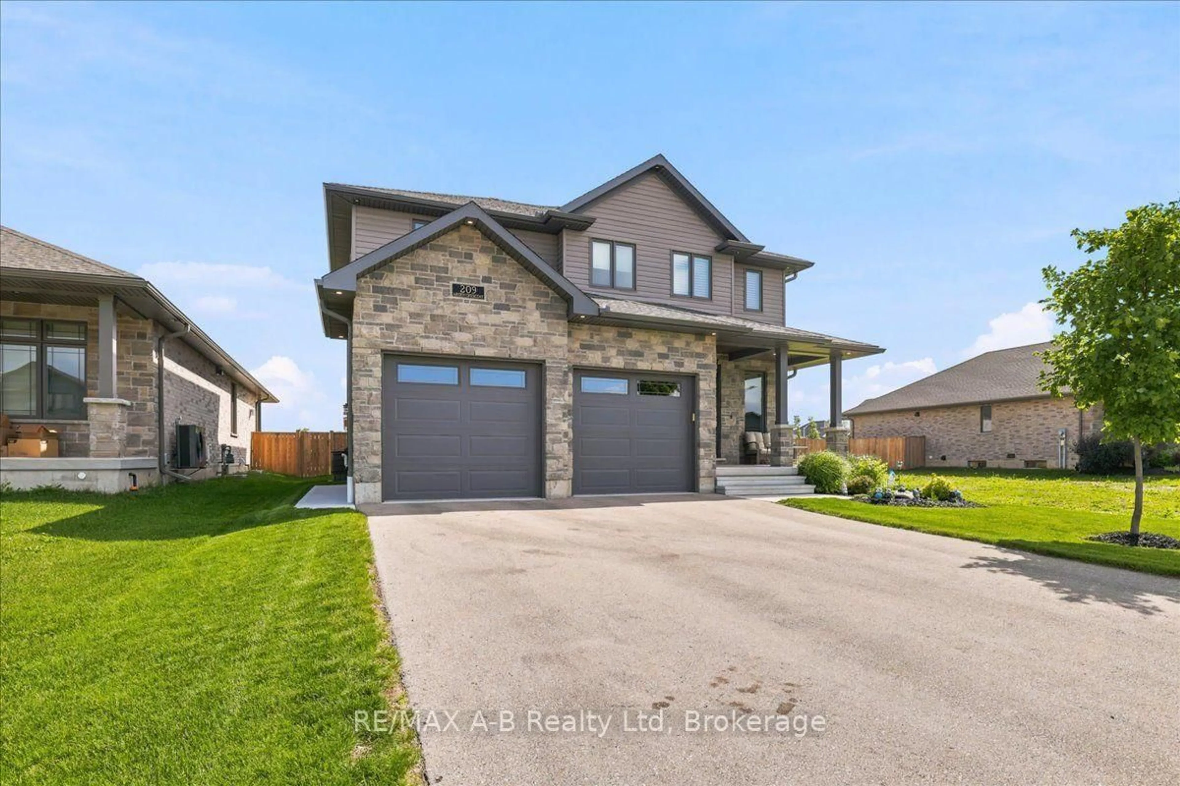 Home with brick exterior material, street for 209 Arden Cres, West Perth Ontario N0K 1N0