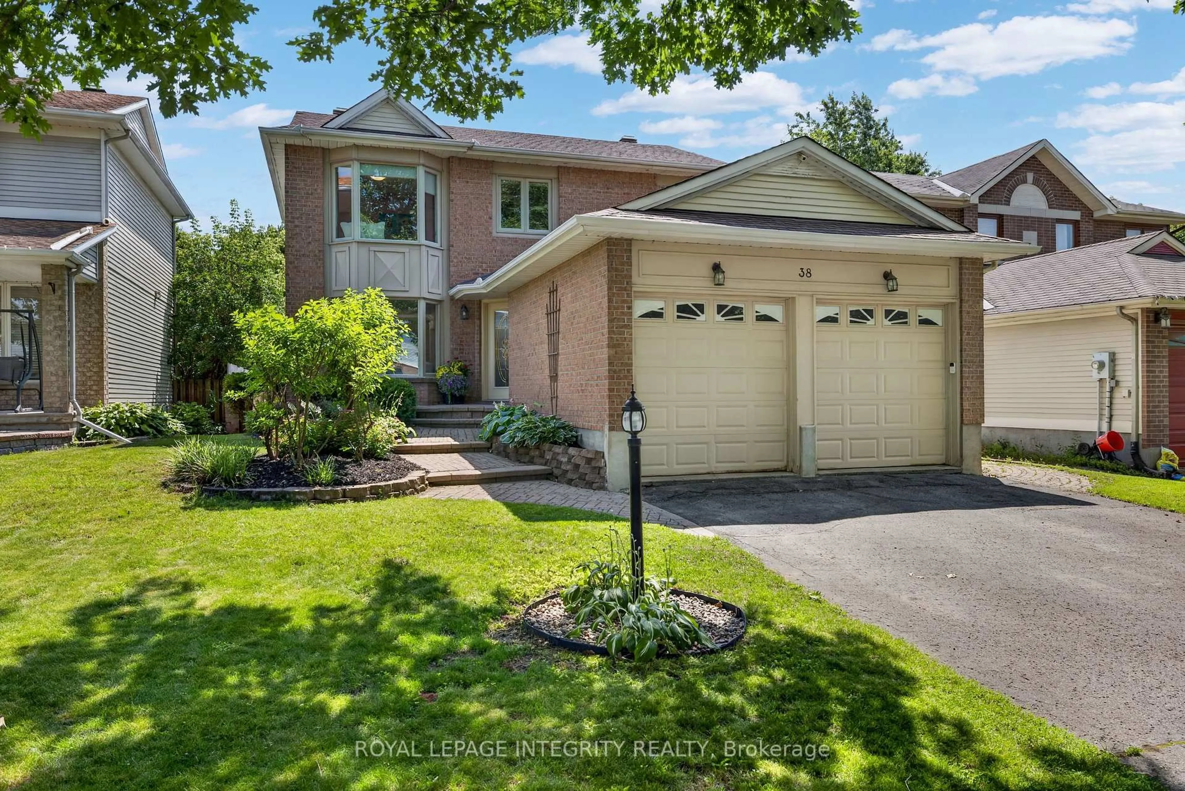 Home with brick exterior material, street for 38 Pebble Creek Cres, Kanata Ontario K2M 2L4