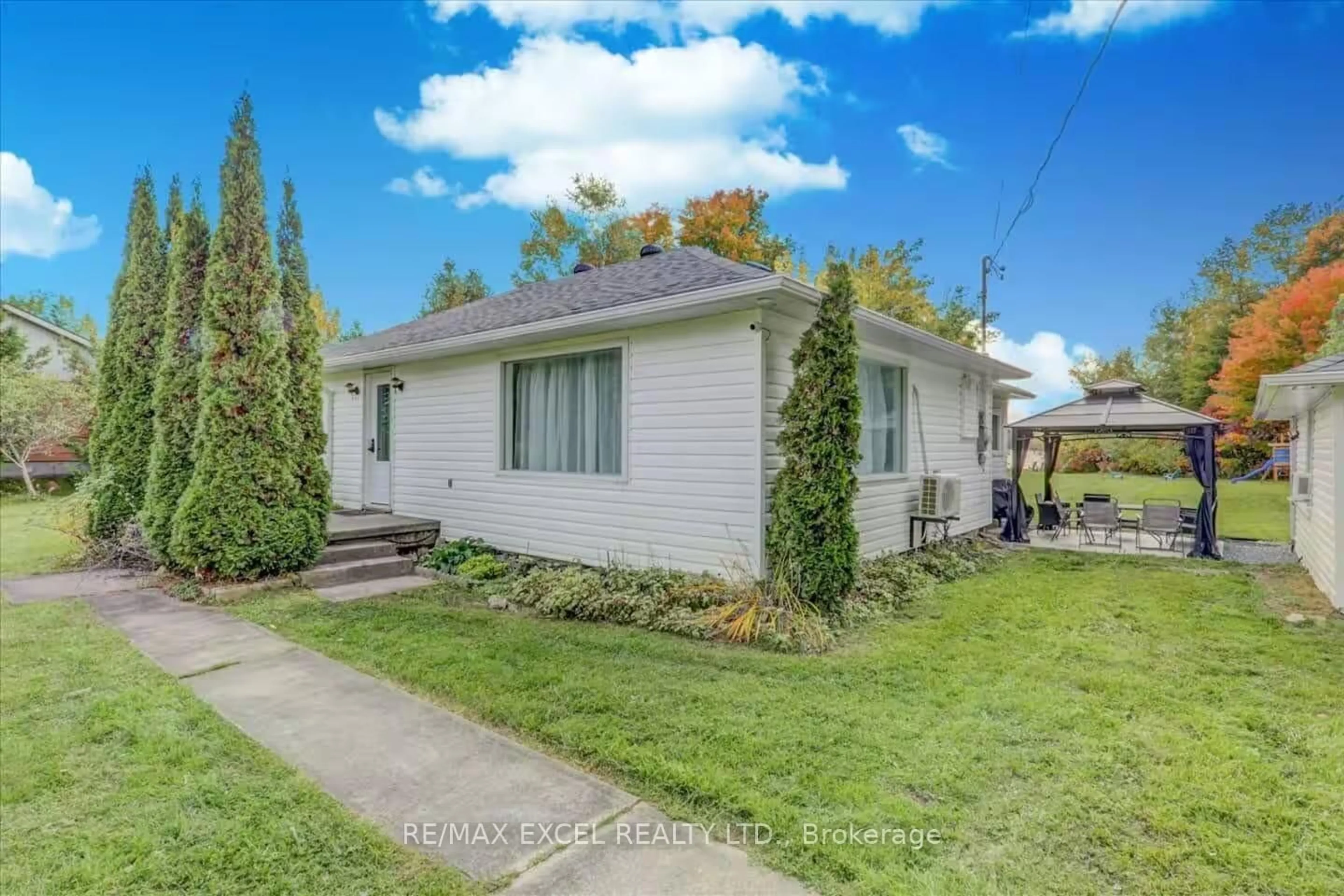 Home with vinyl exterior material, street for 34 Hargrave Rd, Kawartha Lakes Ontario K0M 2B0