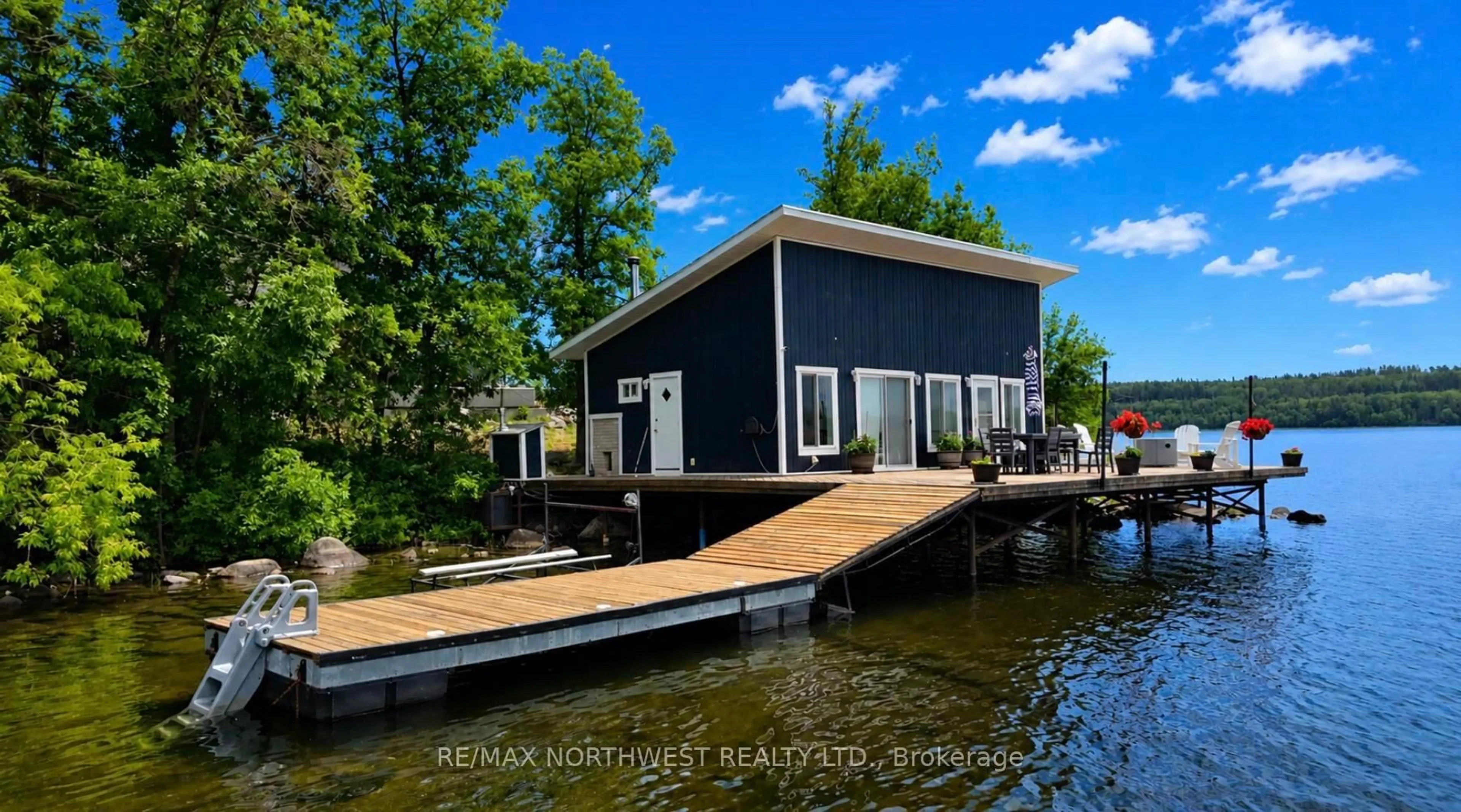 Home with vinyl exterior material, water/lake/river/ocean view for 2532 SCHOOL ROAD, Kenora Remote Area Ontario P0X 1C0