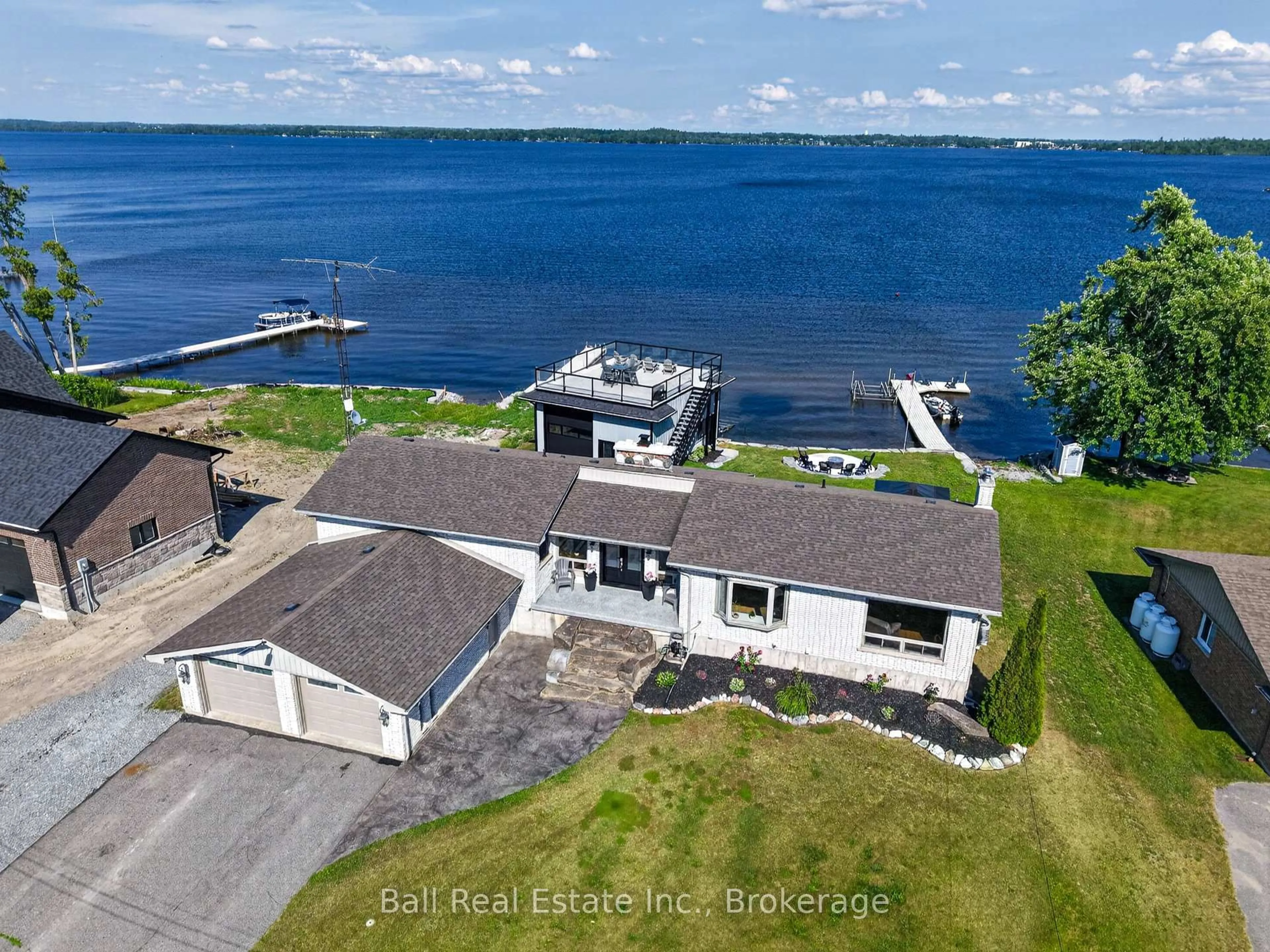 A pic from outside/outdoor area/front of a property/back of a property/a pic from drone, water/lake/river/ocean view for 5336 Highway 35, Kawartha Lakes Ontario K0M 1N0