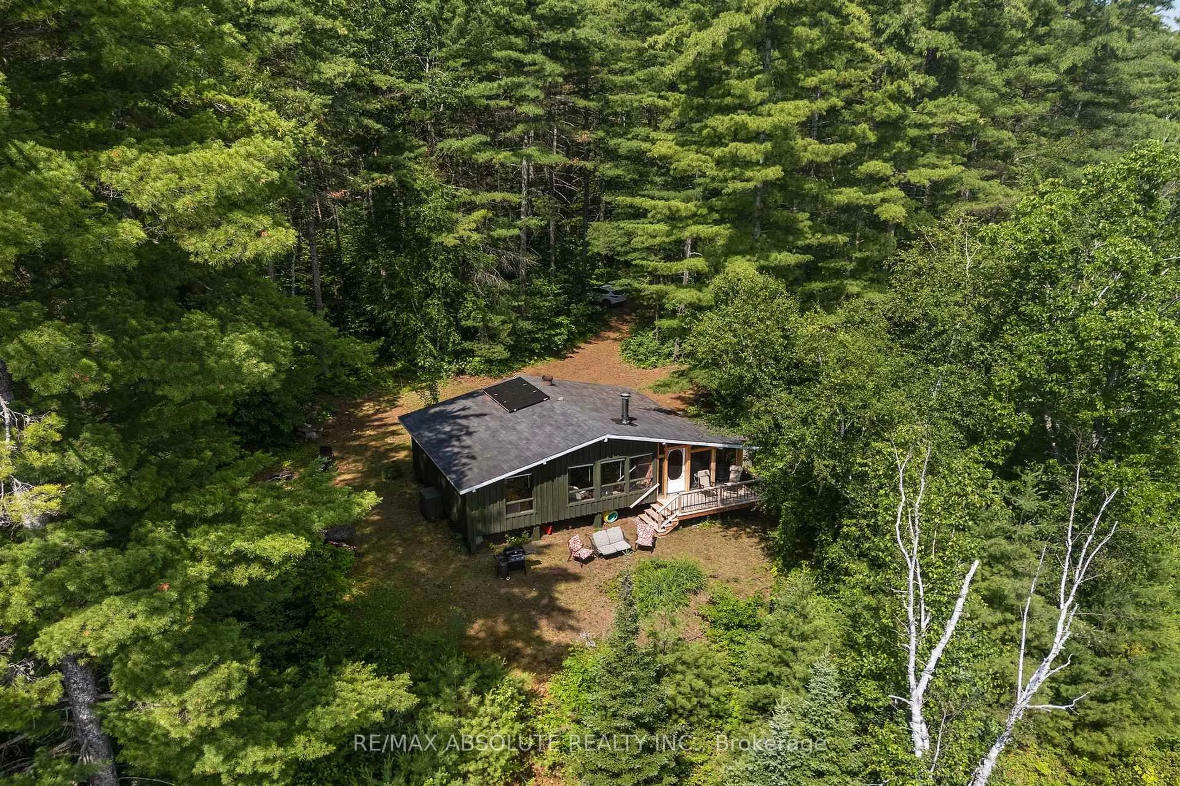 A pic from outside/outdoor area/front of a property/back of a property/a pic from drone, forest/trees view for 311 Tara Tr, Dacre Ontario K0J 1N0