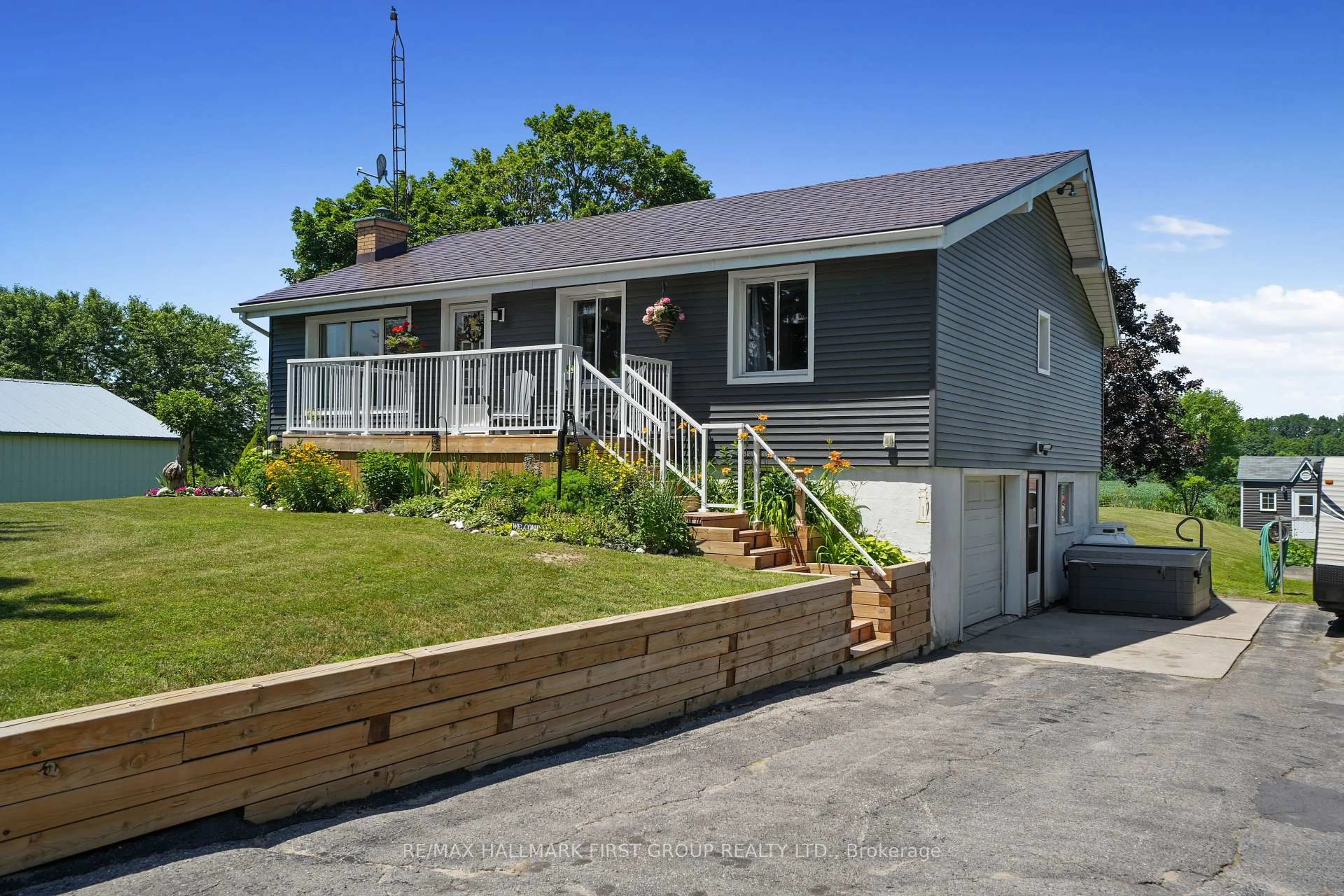 Home with vinyl exterior material, street for 7638 Telephone Rd, Hamilton Township Ontario K9A 4J7