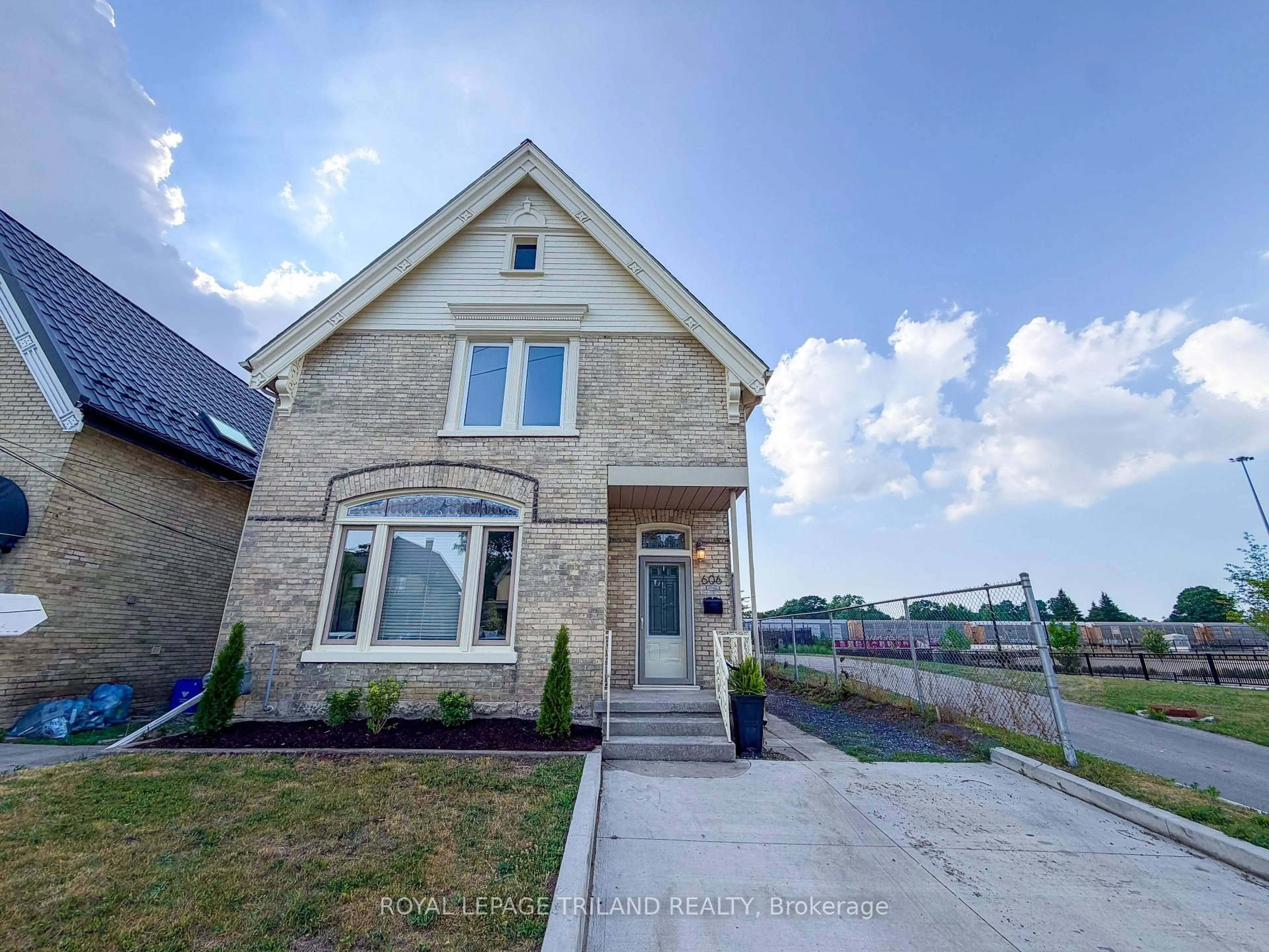 Home with brick exterior material, street for 606 Central Ave, London East Ontario N6B 2G4