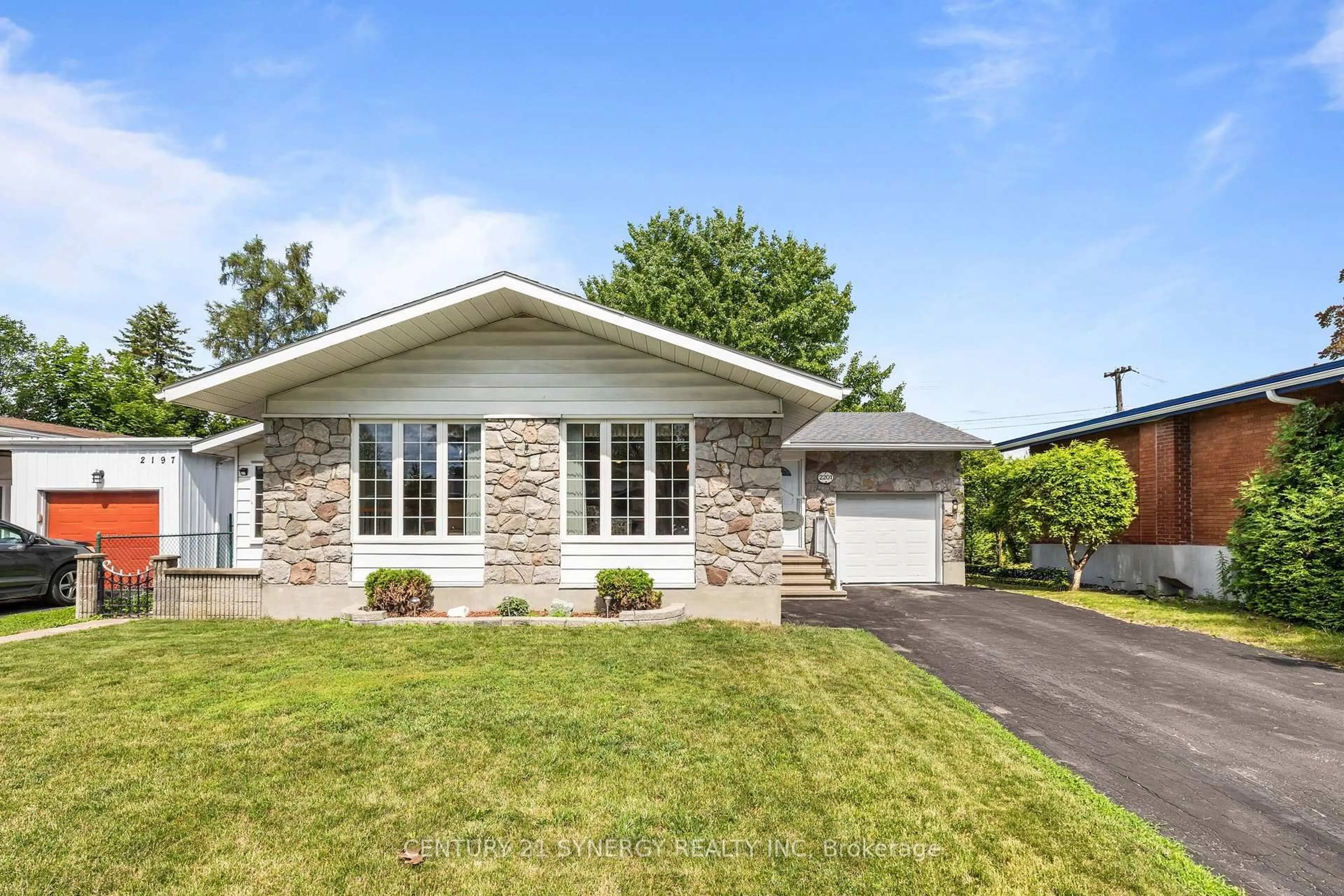 Home with vinyl exterior material, street for 2201 Haig Dr, Ottawa Ontario K1G 2L3