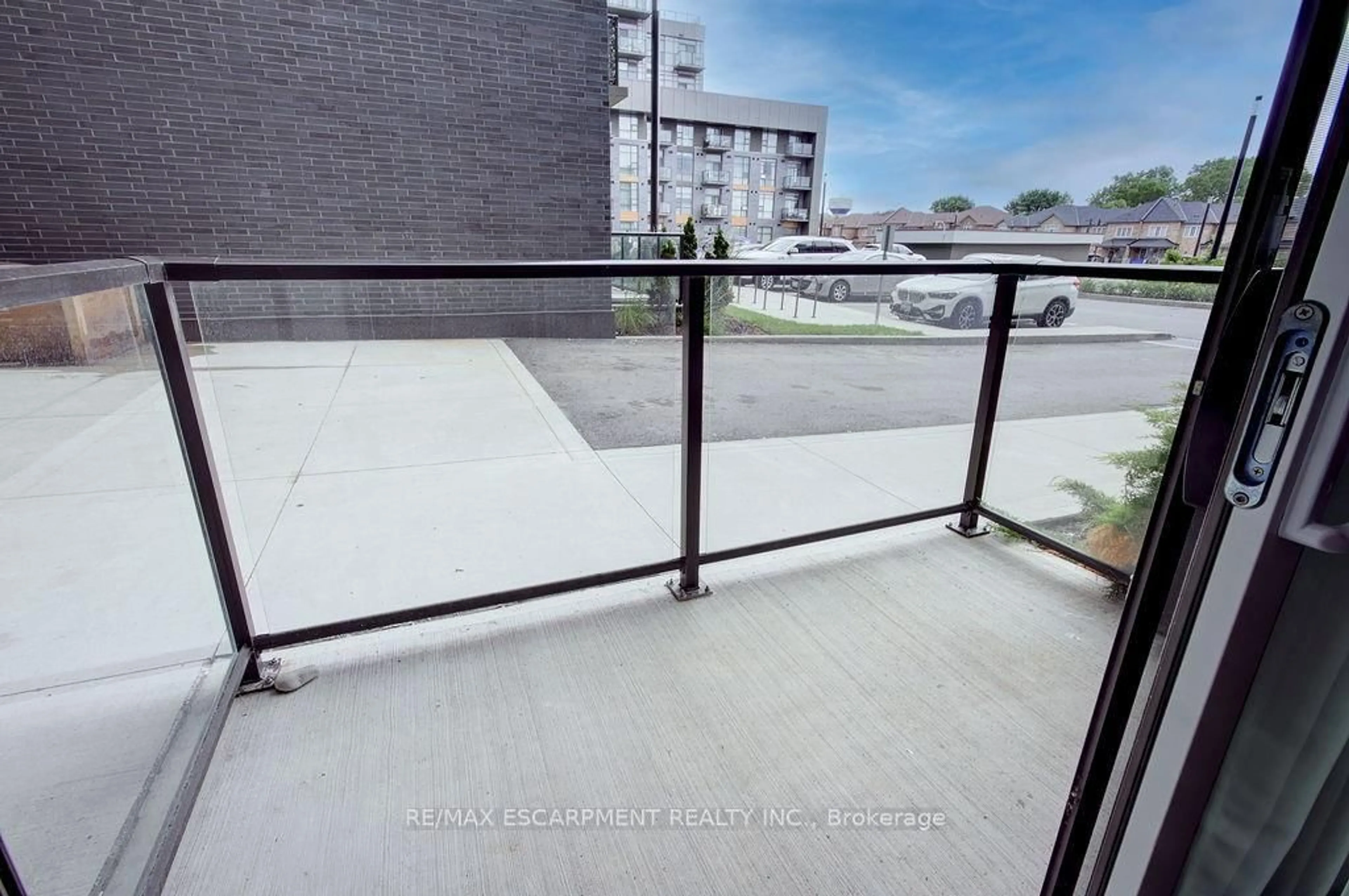 Balcony in the apartment, city buildings view from balcony for 450 Dundas St #110, Hamilton Ontario L8B 0L7