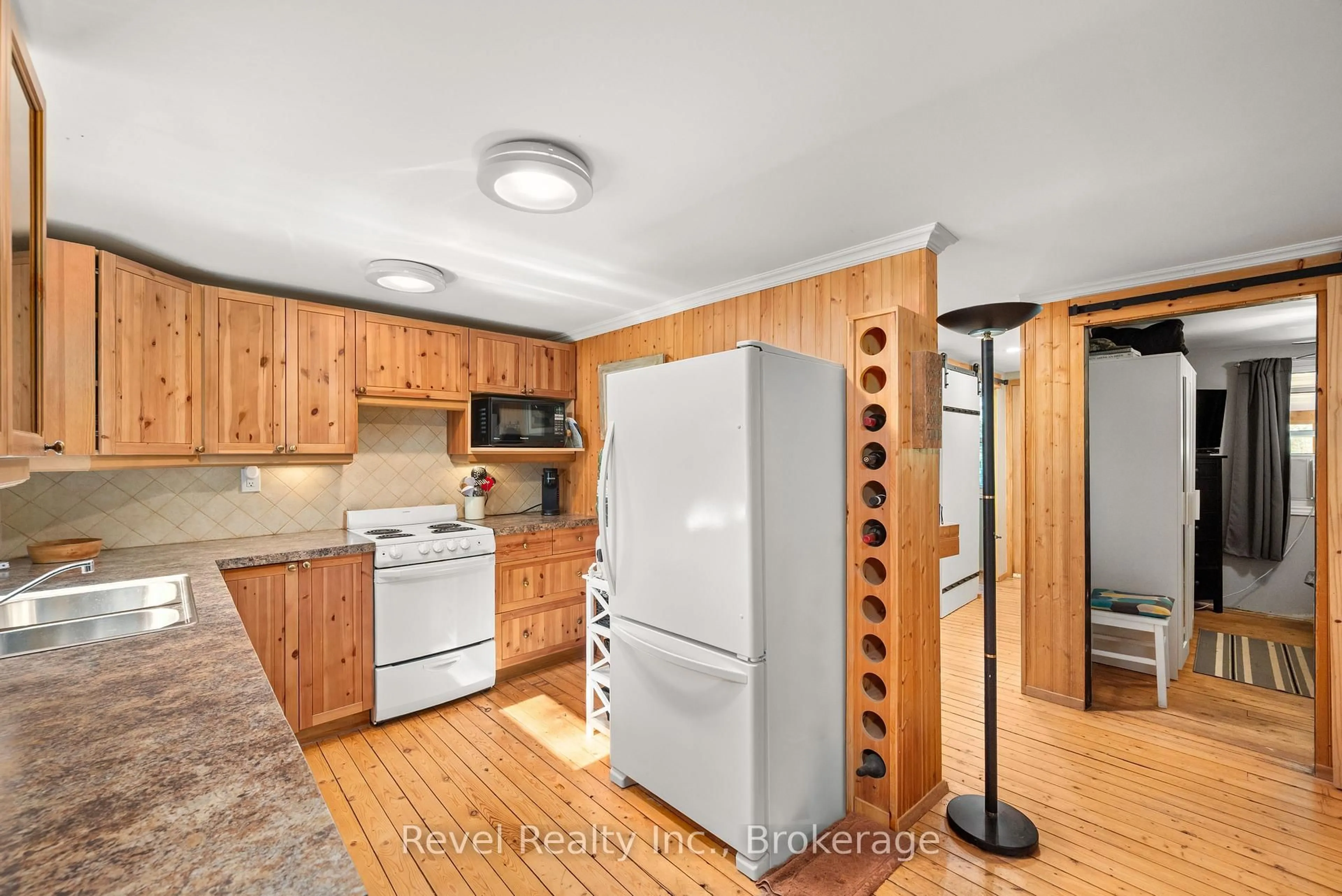 Standard kitchen, wood/laminate floor for 59 Brook Rd, Kawartha Lakes Ontario K0M 1N0