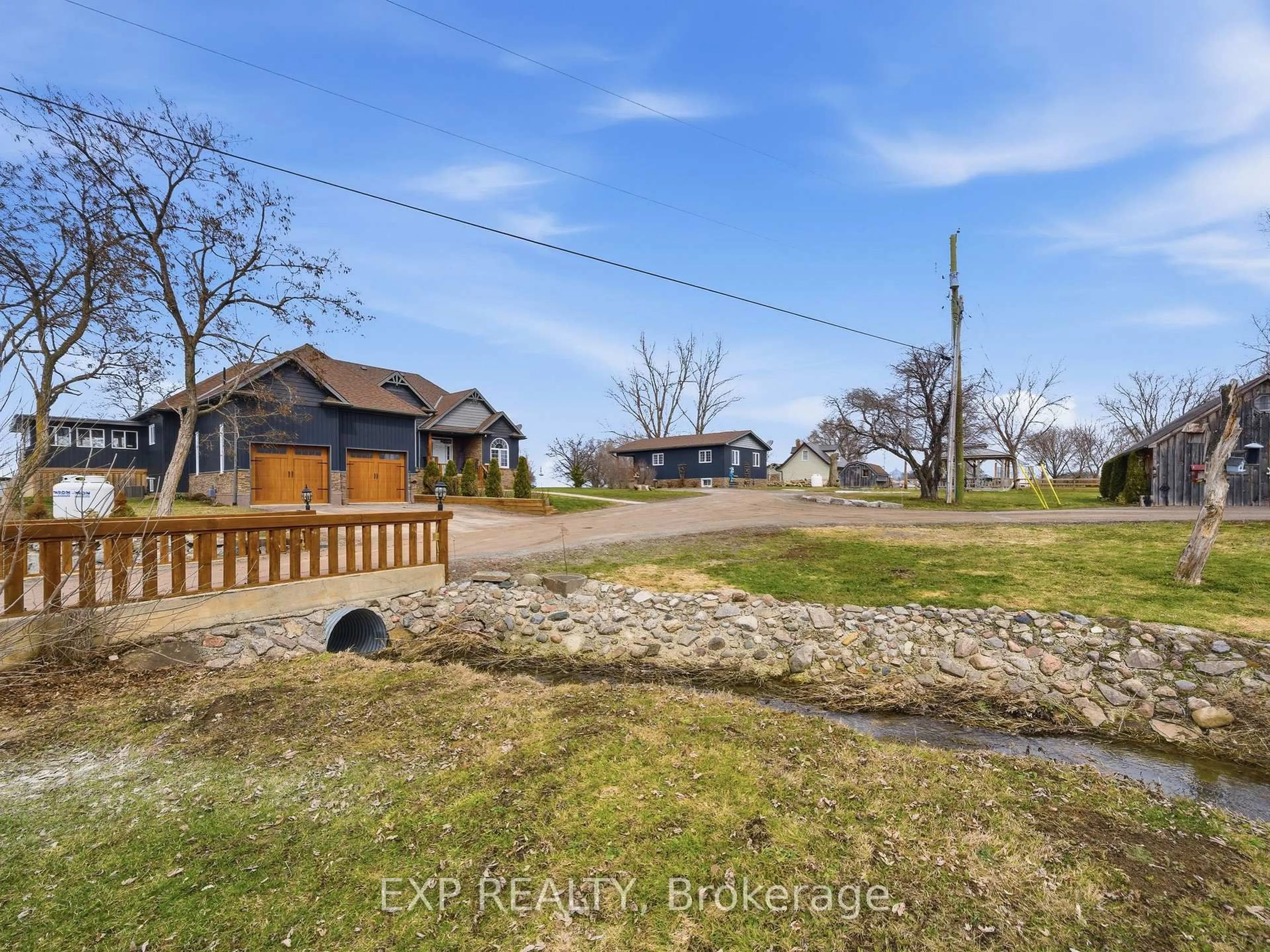 A pic from outside/outdoor area/front of a property/back of a property/a pic from drone, water/lake/river/ocean view for 516 Allison Rd, Prince Edward County Ontario K0K 1W0