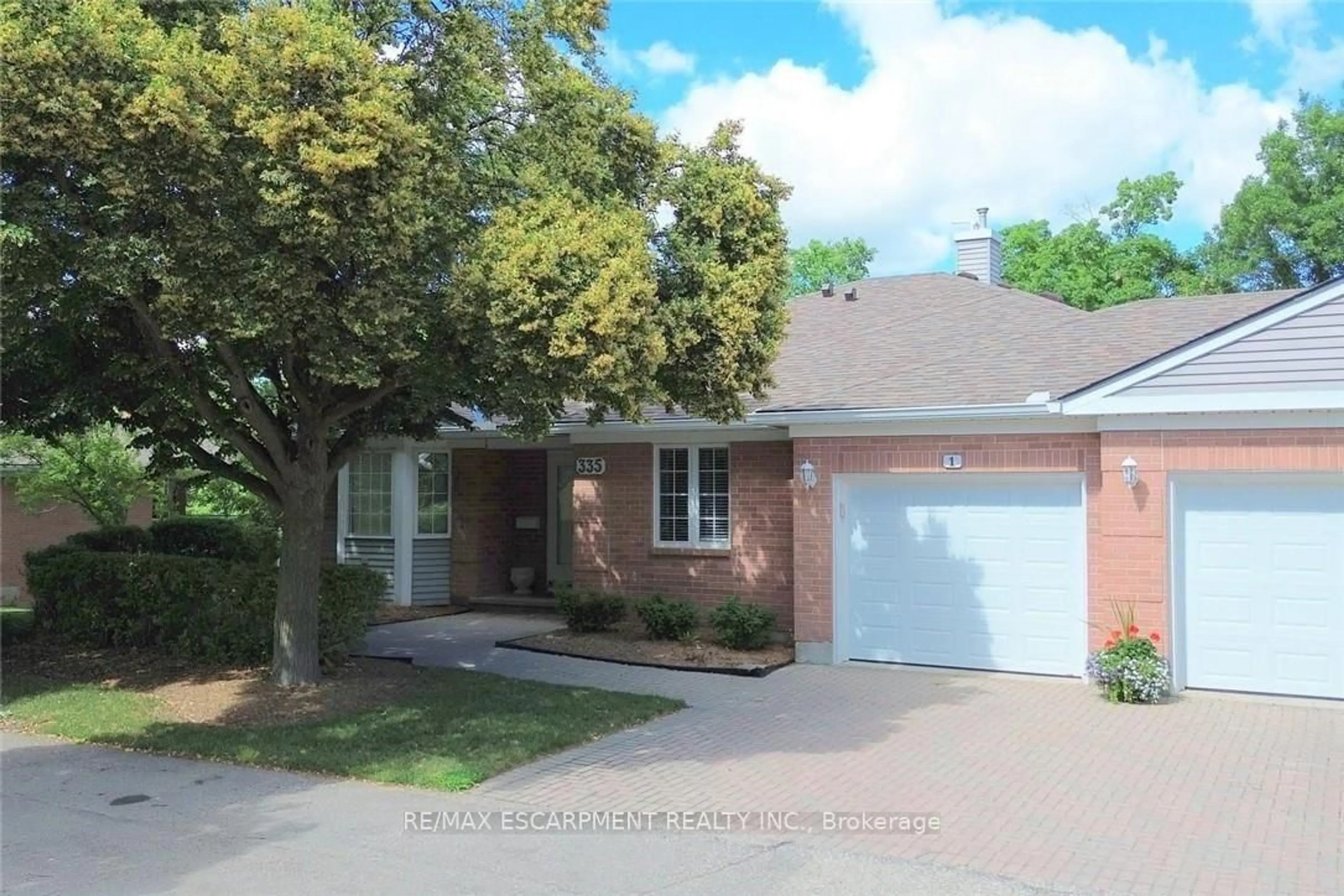 Home with brick exterior material, street for 335 George St #1, Cambridge Ontario N1S 4X7