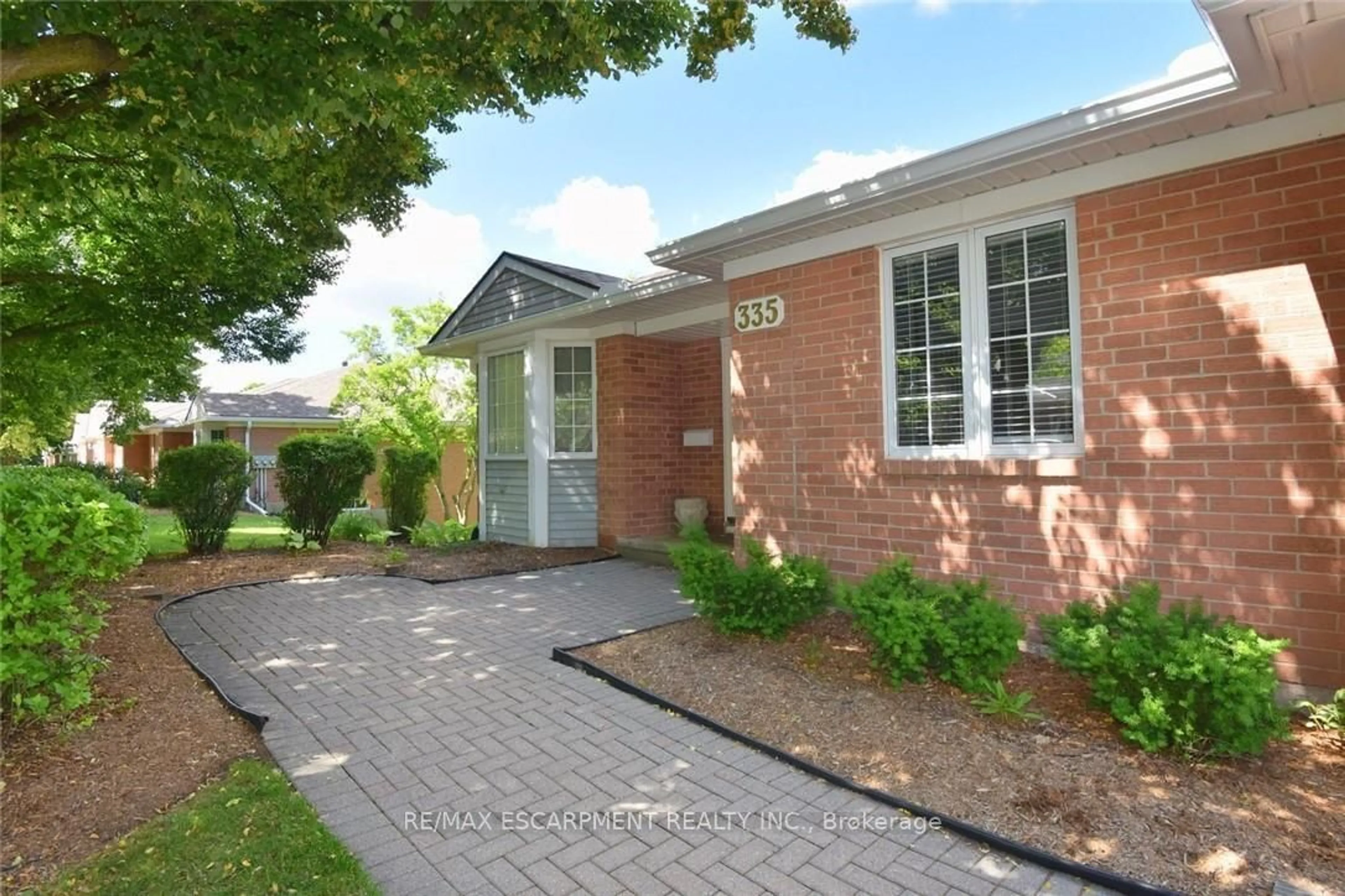 Home with brick exterior material, street for 335 George St #1, Cambridge Ontario N1S 4X7
