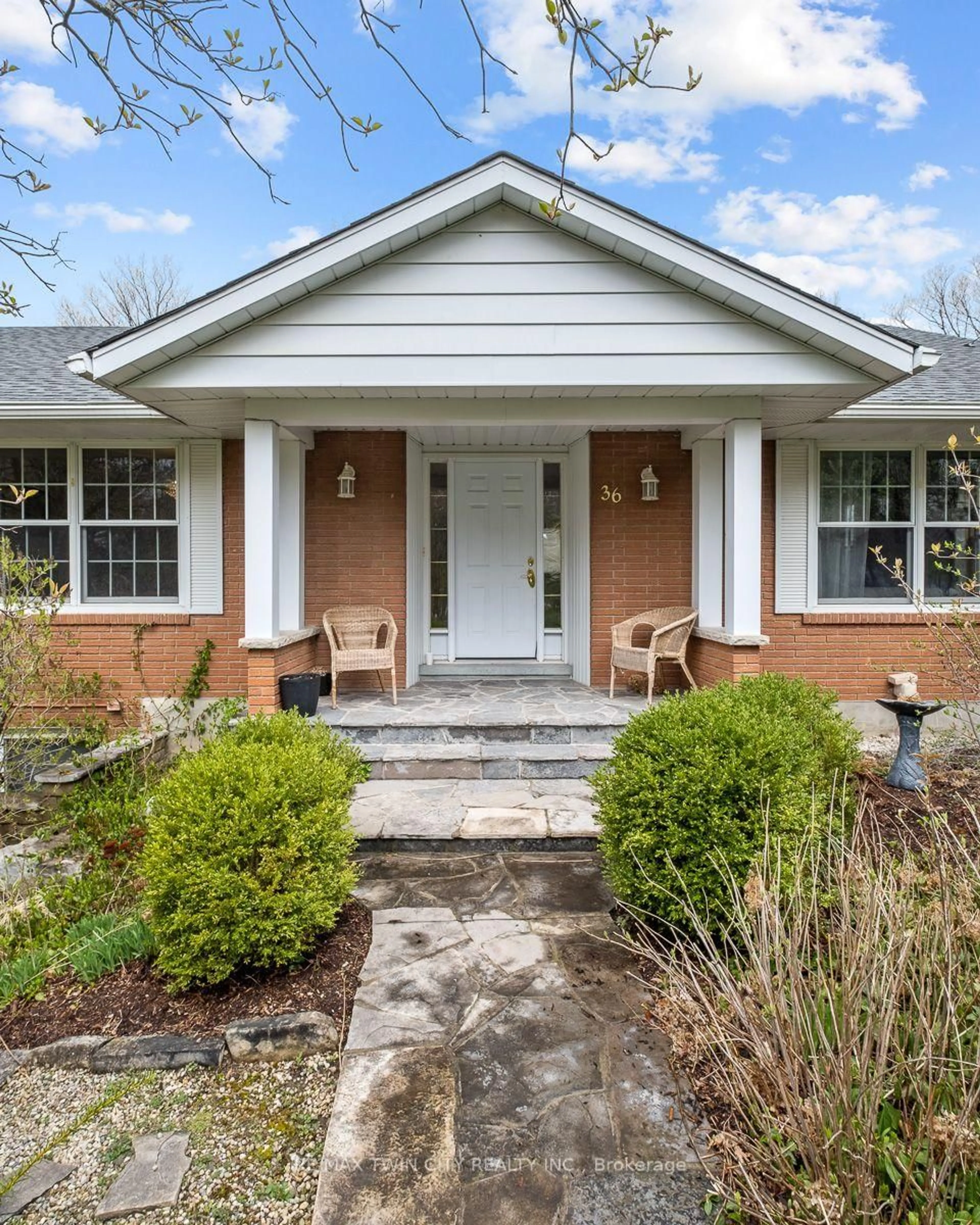 Home with brick exterior material, street for 36 Maple Hill Dr, Kitchener Ontario N2M 2R8
