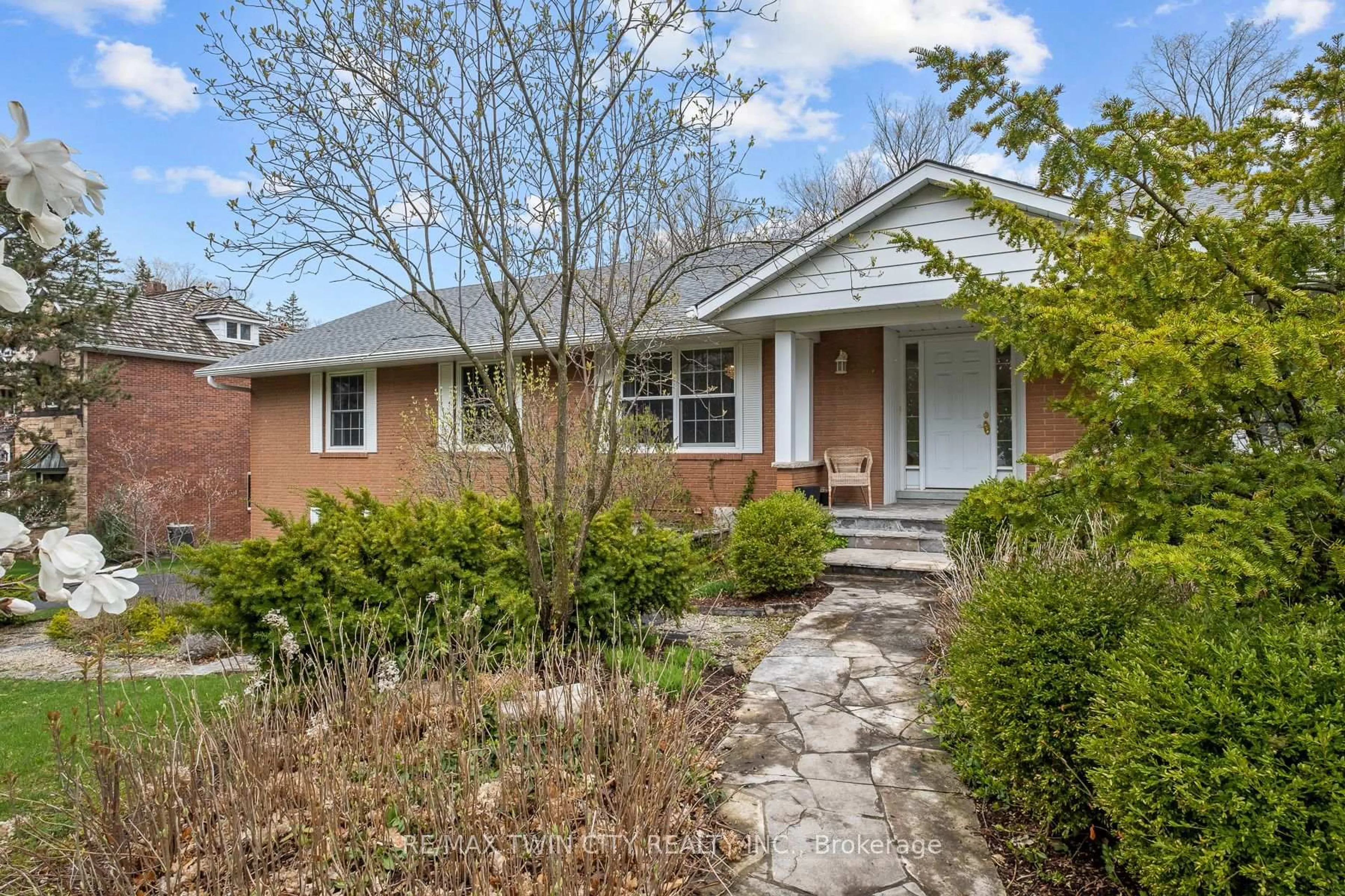 Home with brick exterior material, street for 36 Maple Hill Dr, Kitchener Ontario N2M 2R8