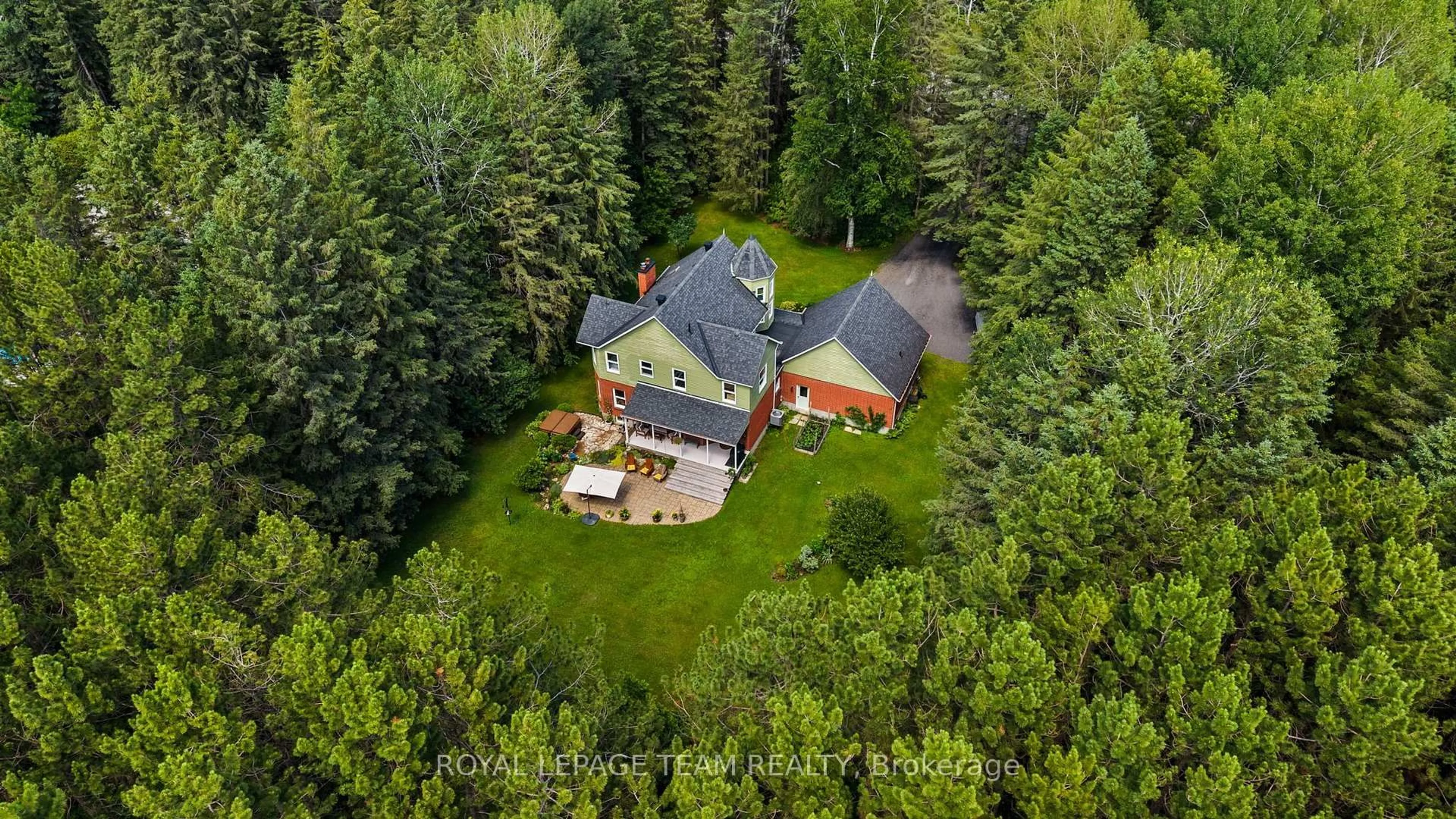 A pic from outside/outdoor area/front of a property/back of a property/a pic from drone, forest/trees view for 28 Kimini Dr, Ottawa Ontario K2S 1S6