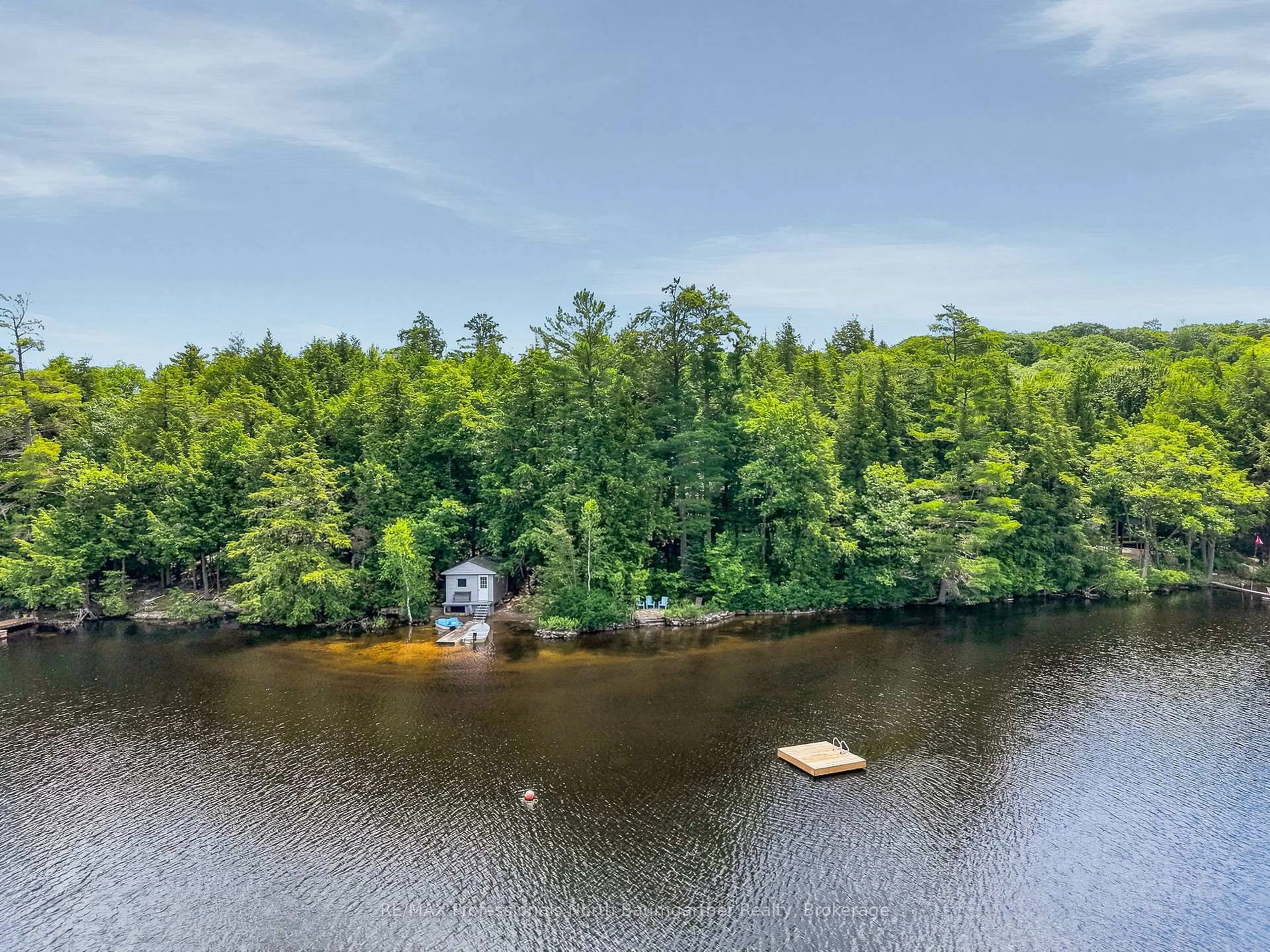 A pic from outside/outdoor area/front of a property/back of a property/a pic from drone, water/lake/river/ocean view for 1202 Three Brothers Dr, Algonquin Highlands Ontario K0M 1S0