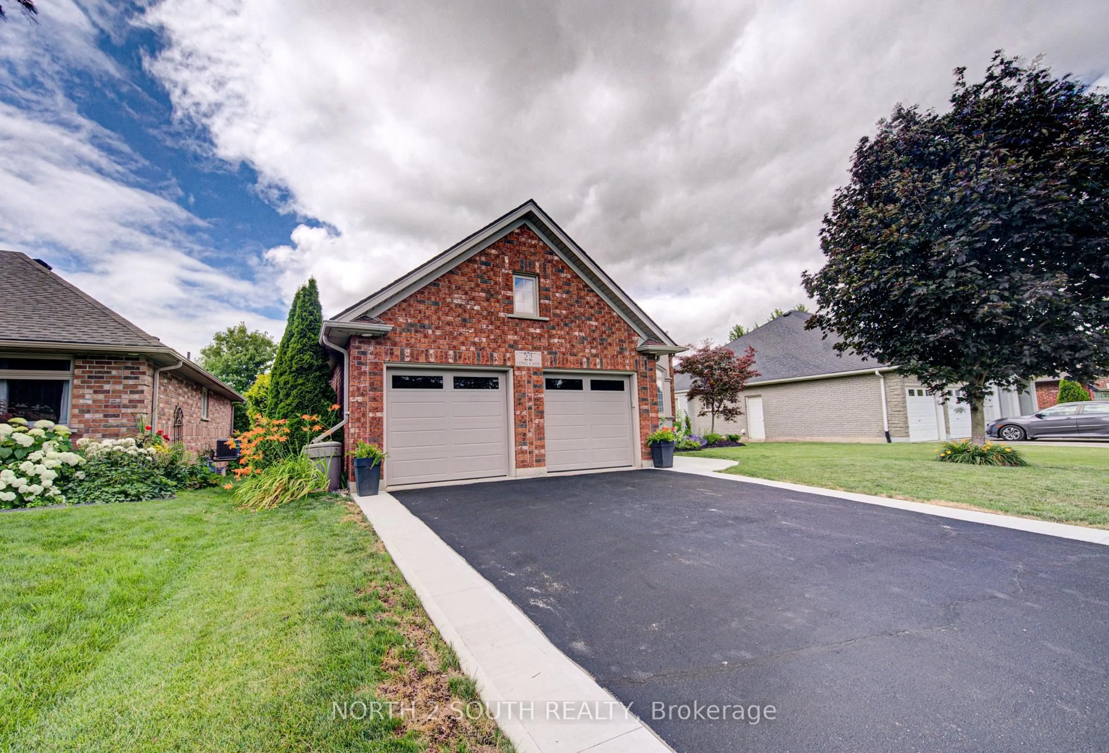 Home with brick exterior material, street for 22 Long Lane, Brant Ontario N3L 4E9