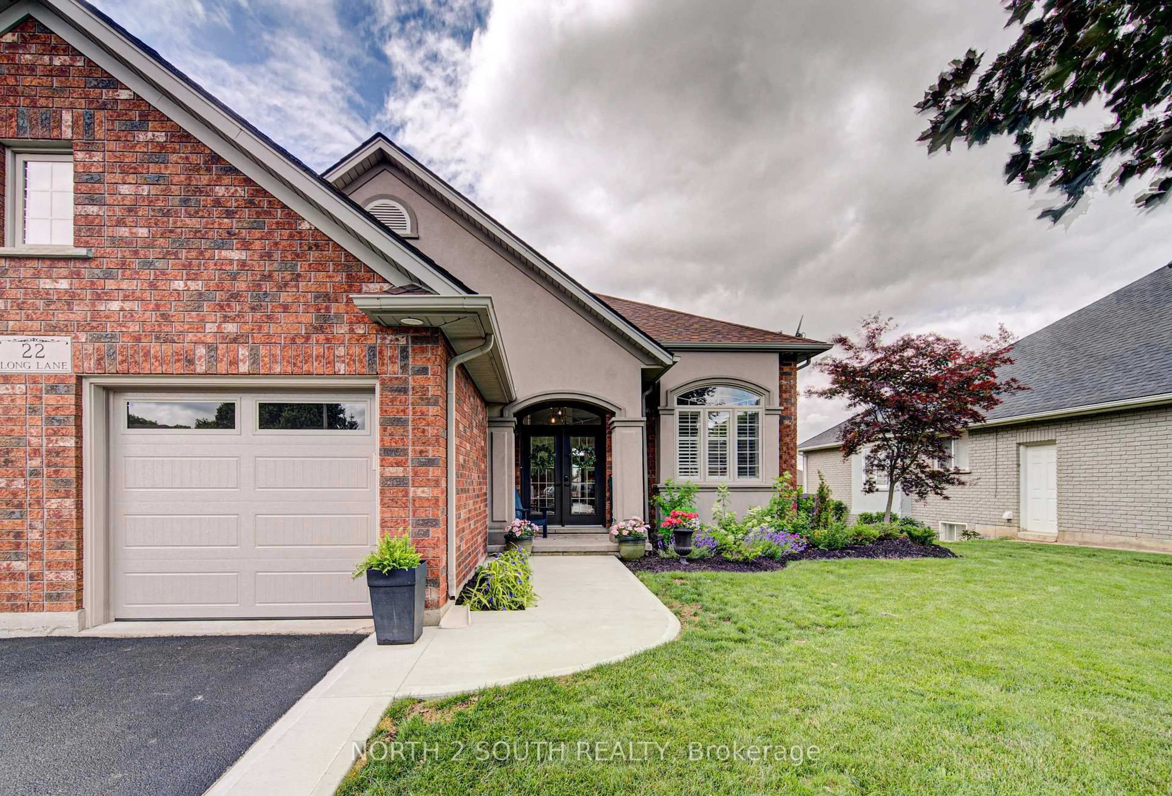 Home with brick exterior material, street for 22 Long Lane, Brant Ontario N3L 4E9
