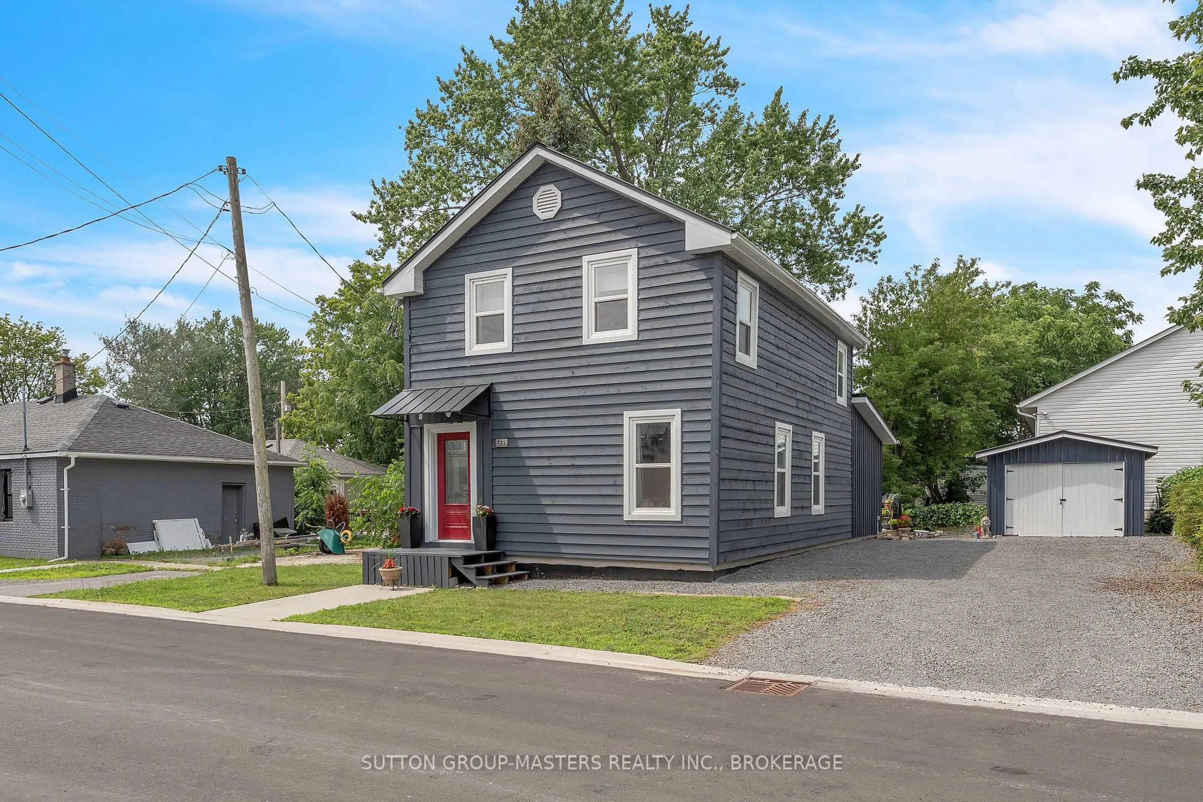 Home with vinyl exterior material, street for 173 Davy St, Bath Ontario K0H 1G0