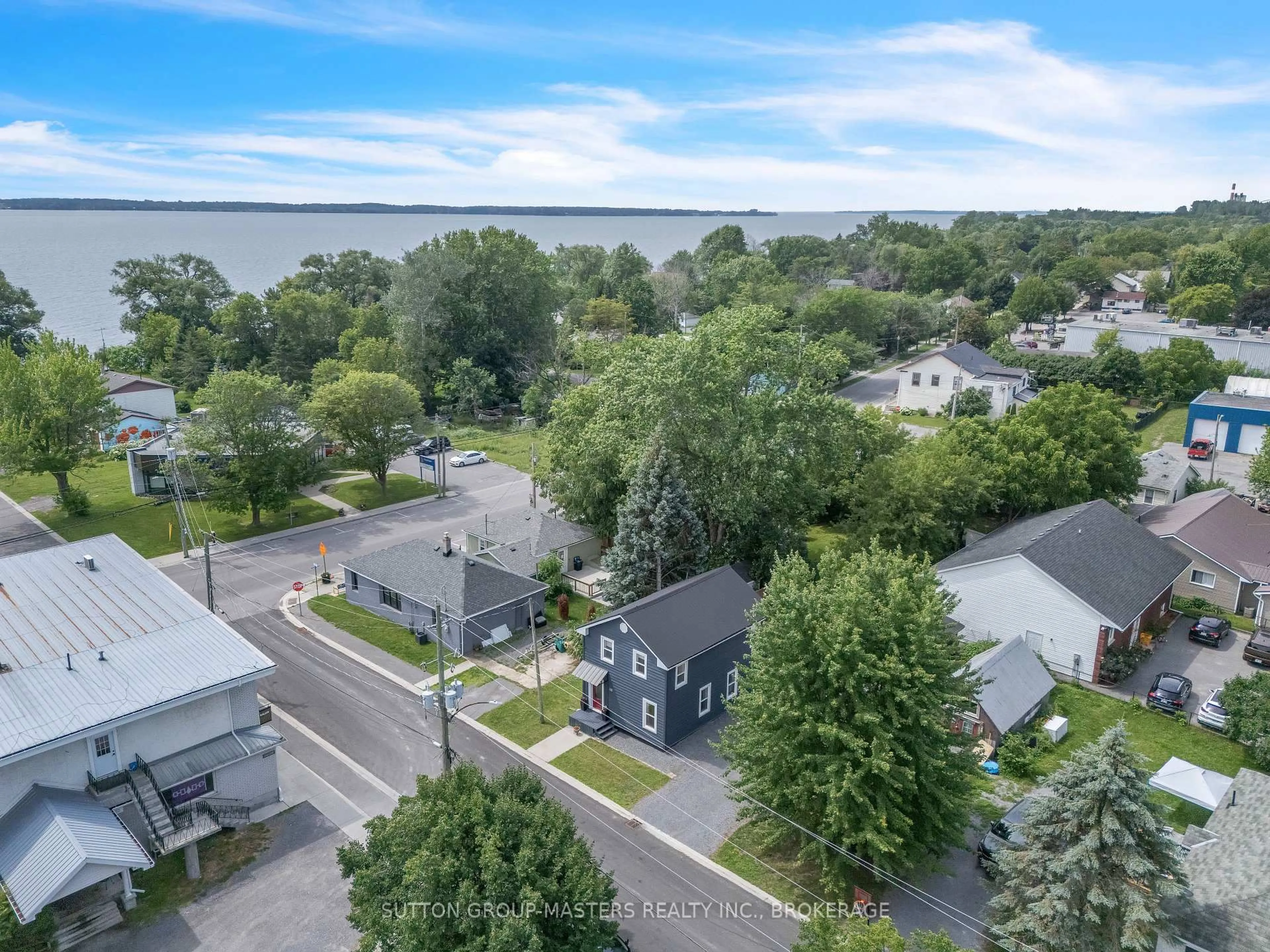 A pic from outside/outdoor area/front of a property/back of a property/a pic from drone, water/lake/river/ocean view for 173 Davy St, Bath Ontario K0H 1G0