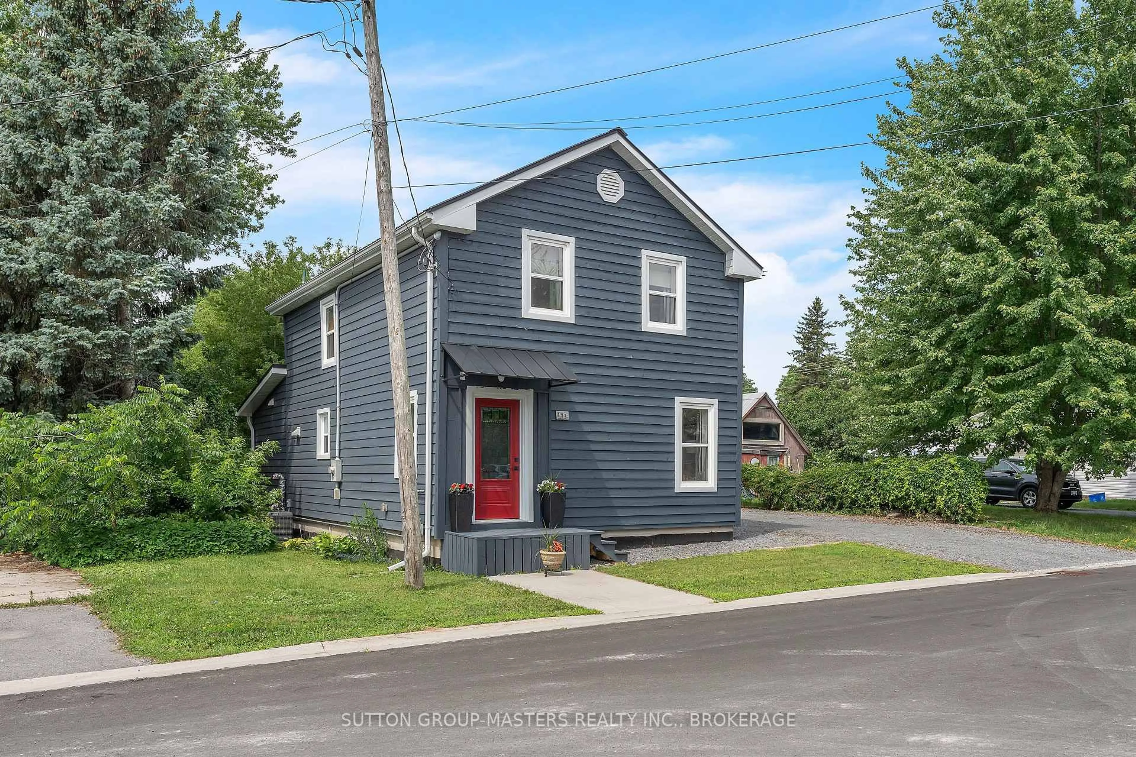 Home with vinyl exterior material, street for 173 Davy St, Bath Ontario K0H 1G0