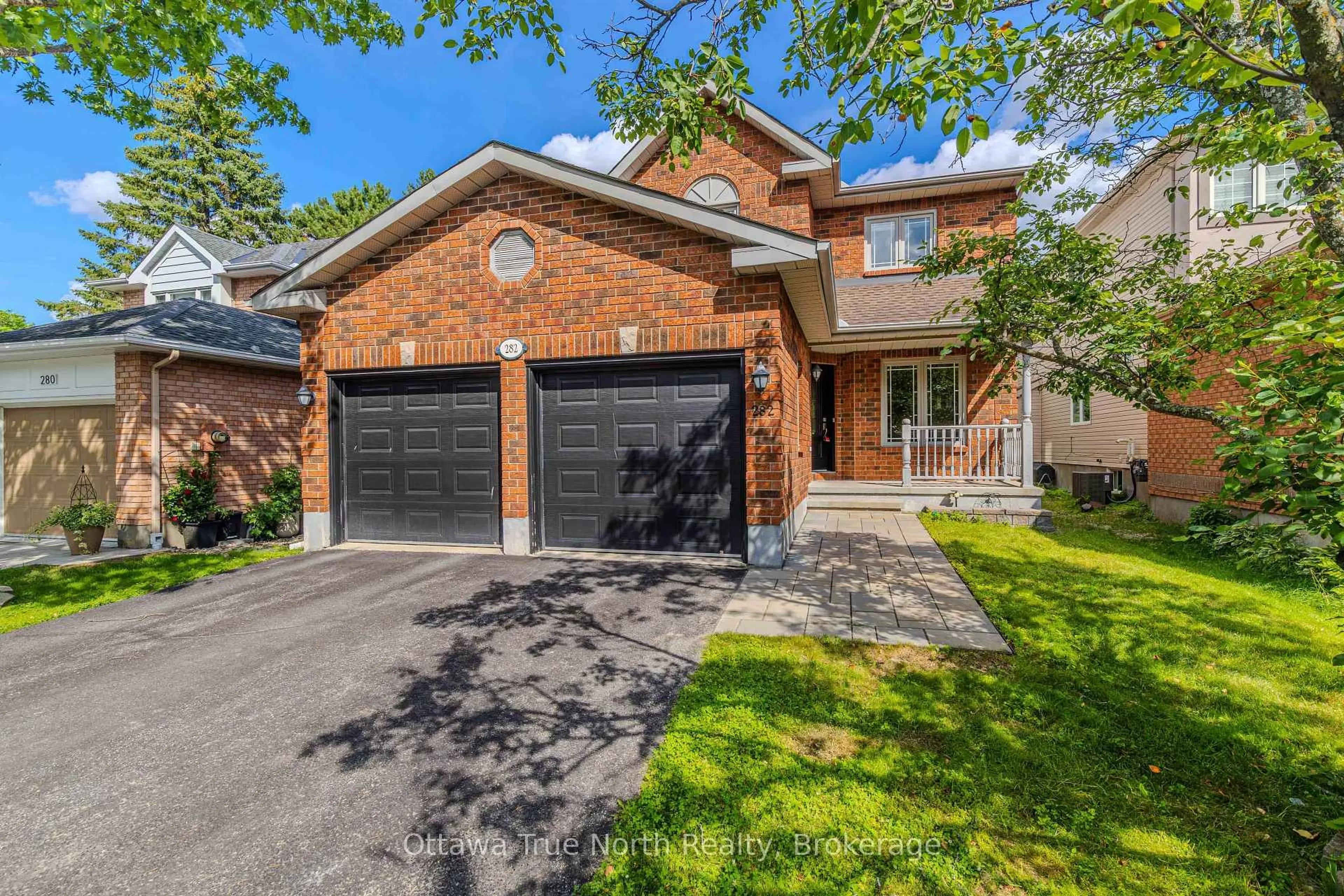 Home with brick exterior material, street for 282 Knudson Dr, Kanata Ontario K2K 2N8