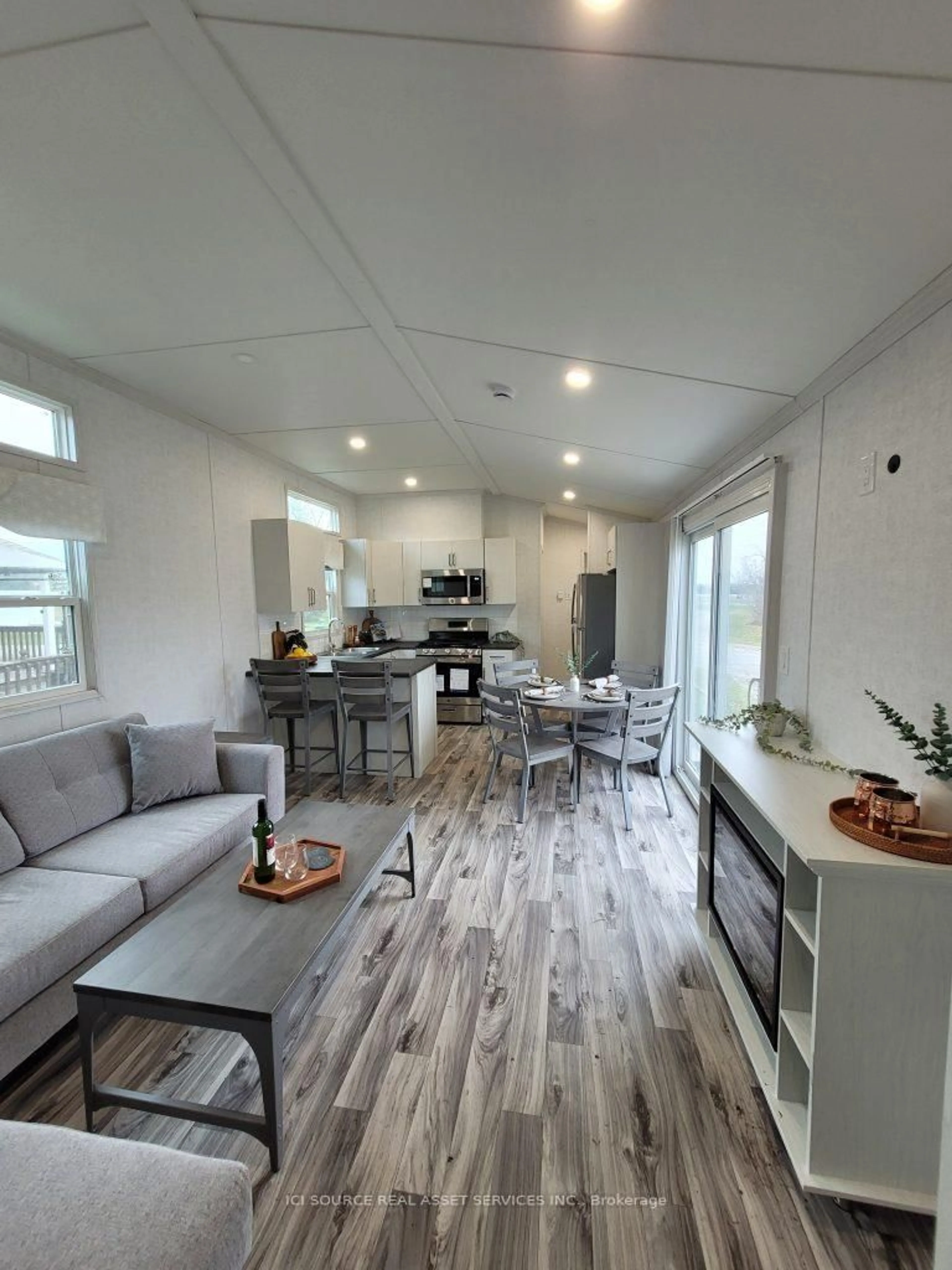Open concept kitchen, wood/laminate floor for 171 Woodland Estates Rd #BBD030, Trent Hills Ontario K0L 1L0