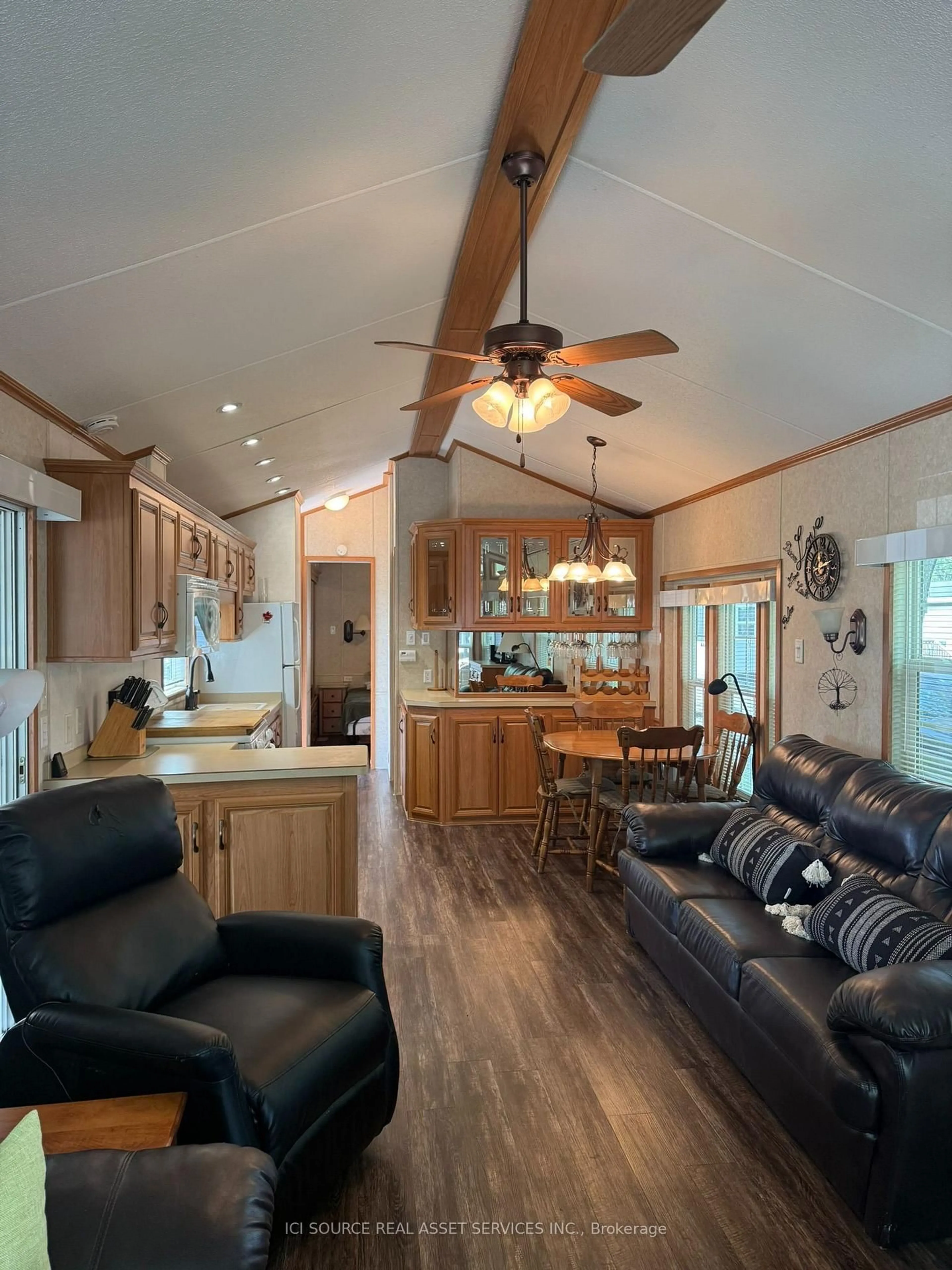 Open concept kitchen, wood/laminate floor for 486 County Road 18 #CBL20, Prince Edward County Ontario K0K 1P0